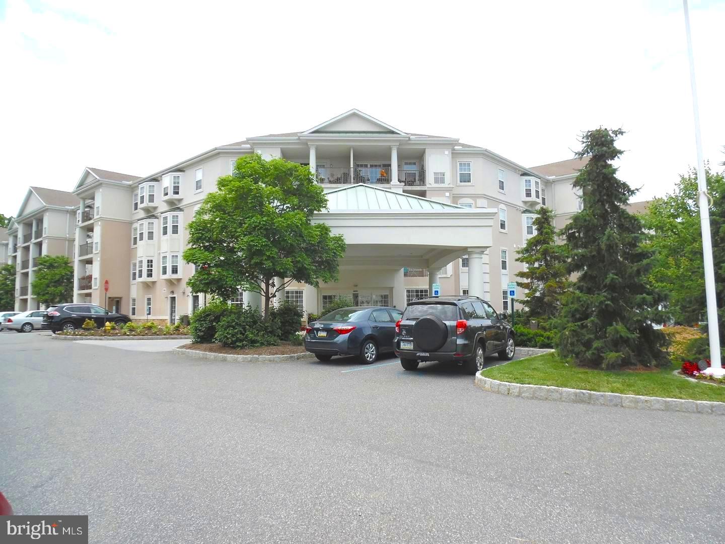 Welcome to this beautiful 4th floor unit at Windsor of Glen Mills, A 55+ Community with many amenities!! The floor plan features entry Foyer with large coat closet. Eat-In Kitchen, Laundry Room with Pantry and hot water closet. Dining Area off the Kitchen and nice size Living Room with sliders to the Balcony which houses the heater room and storage. Master Bedroom has walk-in closet, bay window and full Bath with walk-in shower. 2nd Bedroom and Hall Bath. The amenities include Computer Room, Card Room, Library, Banquet Room with full Kitchen, TV Room, Pool Room, Mail Room, Common Area, Lobby with fireplace for relaxing. One car garage parking space included, #22 and private storage closet #29. There is a 1 time fee of $1,000. Association Condo Fee includes common area lawn, pool and exterior maintenance, sewer, snow and trash removal and water! Steel and concrete construction. Hardwood floors through-out except Bedrooms. Convenient location! A Must See!