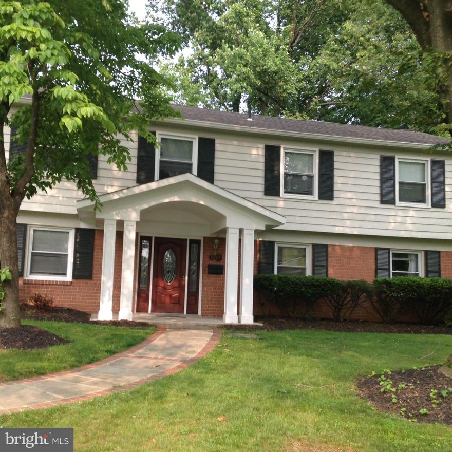 NEW PRICE!!!  Spacious newly renovated and painted, 2 Level Colonial style with  4 bedrooms, 3.5 baths. The first floor has an INLAW SUITE with a  bedroom, full bathroom, family room and private entrance.  The upper level offers a beautiful open concept kitchen featuring granite countertops, large skylights and hardwood floors throughout, the primary bedroom suite with high ceiling, great light, newly renovated bathroom with walk-in private shower and soaking bathtub, large walk in closets. Two other bedrooms have their own bathroom, plus an additional half bath for visiting company. The backyard outdoor deck is accessible from beside the kitchen. High fence for backyard privacy and large shed. The home is in an excellent location, with easy access to 270 and 495, shopping, restaurants, and entertainment.