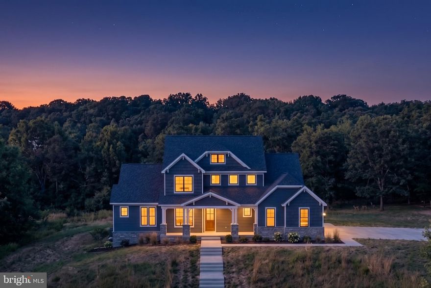 Experience luxury new construction by Laine Street Homes on over an acre with scenic wooded surroundings and no restrictive HOA. This thoughtfully designed to-be-built home, currently under construction, features a stunning two-story foyer, spacious family room with gas fireplace, gourmet kitchen with oversized island and upgraded ZLINE stainless steel appliances, morning room, private study, and luxurious main-level primary suite. A covered front porch and rear deck overlook trees and open space.

Upstairs offers three additional bedrooms and two full baths, while the finished walkout basement includes another bedroom and full bath.

Luxury finishes and quality craftsmanship throughout include 7" luxury plank vinyl flooring, Craftsman-style railings and doors, modern trim details, custom light fixtures, 2x6 exterior walls, engineered LVL and steel beam support, and HardiePlank siding with stone water table surround. Additional features include high-efficiency dual-zone HVAC,  EV charging pre-wire, and spacious 3-car garage. Built with energy efficiency in mind with R-49 attic insulation, foam and caulk air sealing package, ThermaTru insulated doors, and Pella Low-E windows.

List price includes the options and finishes shown in the plans and is not a base price. Photos are renderings and examples of this model and similar homes by Laine Street Homes and are shown for reference only. Construction has begun and is expected to be completed in the Fall of 2026. Call listing agent for details.

Just minutes from Downtown Frederick, with easy access to Rt. 15, I-70, and I-270, approximately 50 miles to both Washington D.C. and Baltimore, and close proximity to shopping, dining, parks, and hiking trails.