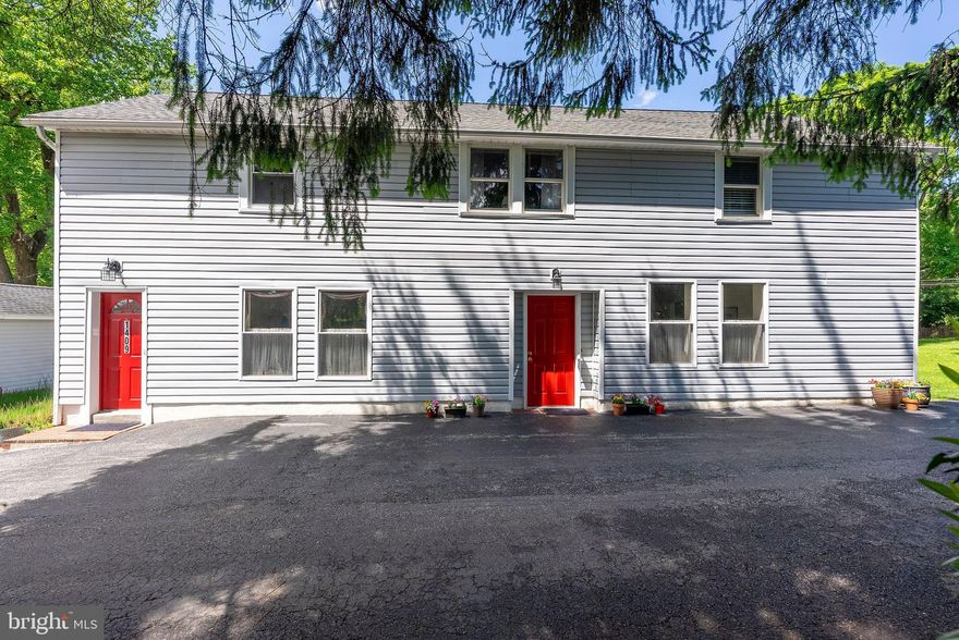 This charming and well-maintained home overlooks green pastures and mature trees in the highly desirable Falls Road Corridor! Featuring large, spacious rooms and a flexible layout, this home provides endless possibilities for comfortable living and entertaining. Originally built as a garage with an apartment above, the current owner has thoughtfully converted the lower level into wonderful living space with plenty of room for entertaining family and friends. The upper level features a great flow, charming hardwood floors throughout, a spacious family room, separate dining room, two bedrooms, and a full bathroom. The recently updated kitchen includes new countertops and stainless-steel appliances. The lower level includes a second family room with an extra-large storage closet, a lovely great room that leads to the beautiful deck and patio, and a third bedroom currently being used as an office. You will also find a large half bathroom that could potentially be converted into a full bathroom, along with a generous laundry/utility room and excellent closet and storage space. One of the best parts of 1409 Broadway is the backyard oasis, featuring a covered deck, flagstone patio, stunning landscaping, and beautiful greenery. The large storage shed was previously a one-car garage and could be converted back with the proper garage door. RECENT UPDATES INCLUDE: roof 2021, kitchen 2021, well pump 2023, water heater 2019, and HVAC 2011 which has been maintained twice a year since installation. This fantastic location is just minutes from I-695, I-83, local shopping, and everyday conveniences!