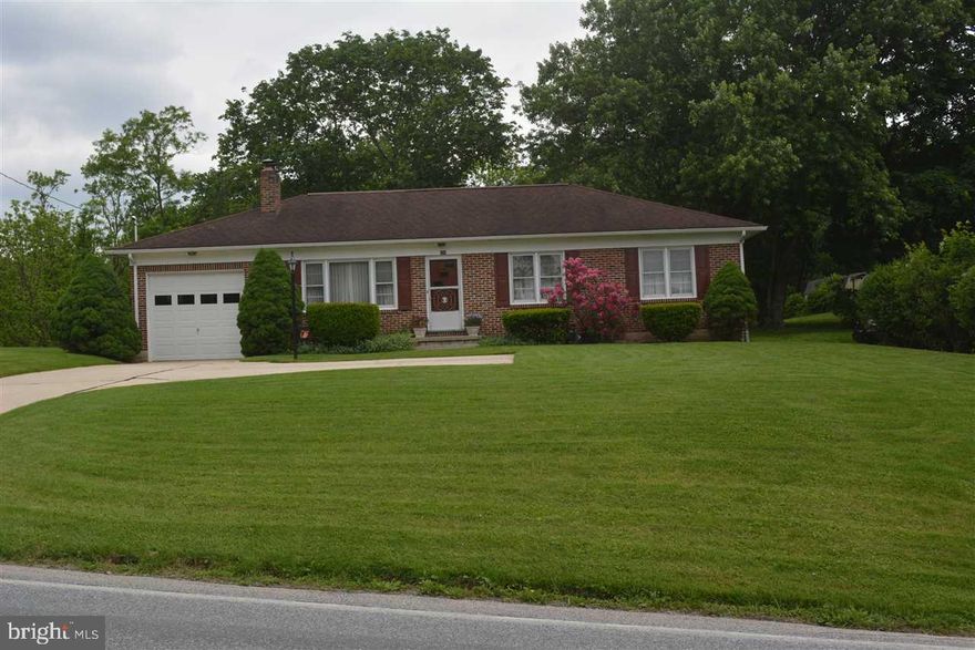 Nice Rancher with hardwood floors under living room carpet. Gas Fireplace with FP logs & FP fixtures included. Walk up attic, full basement with outside walk up basement doors.  Lots of room to have picnics outside and play volleyball. Your 2 acre lot has a small stream at the very back of lot.  Shed   Tax map and Parcel number 83-2-84B also included- Total of 2.13 acres  Listing Agent is a relative of seller.
