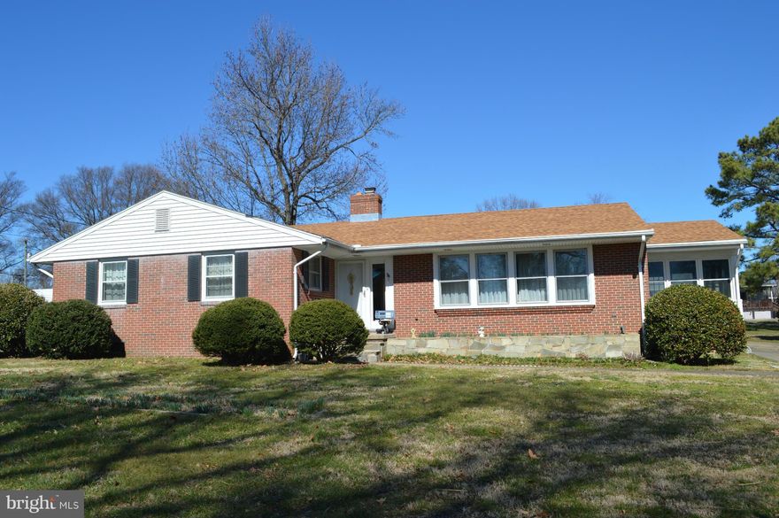 Waterfront brick home w/ pier on Monroe Bay. 1-story 3 bedroom/2 bath, gas fp, water view, sunroom, hardwood floors, golf cart garage/workshop/carport.  No-thru street near downtown area w/ golf cart access to beaches, boat ramp, restaurants & shopping.  Sold "AS IS". Tax cards 3A2 7 4 4, 3A2 3 I 1 and 3A2 3 I-6. Owner inactive real estate license.
