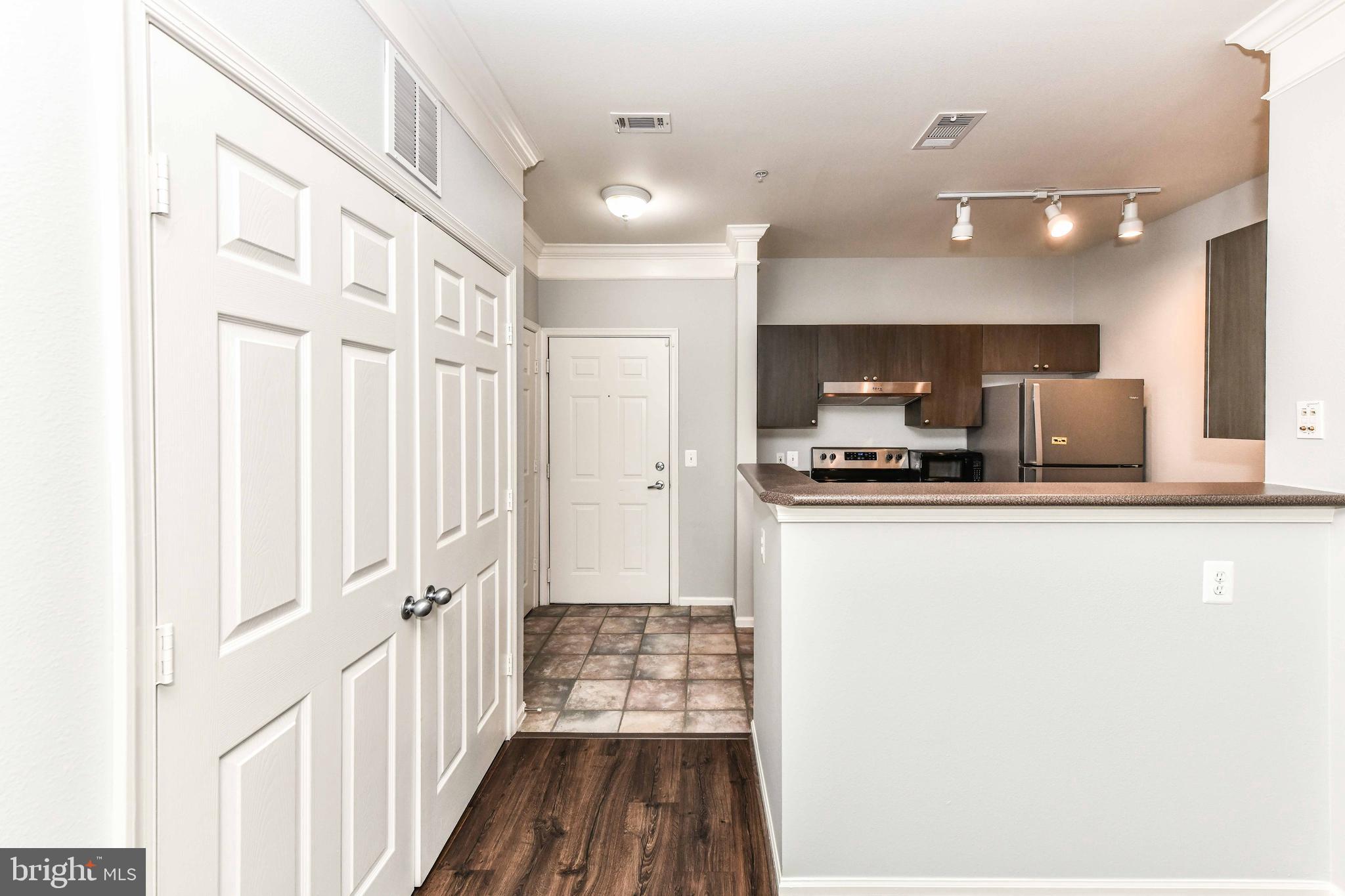 Updated 1BR, 1BA condo with two reserved parking spots at High Pointe at Jefferson Park in the Merrifield Mosaic District*Open floor plan with high ceilings, neutral paint tones & ample sunlight throughout*Updated kitchen with modern cabinetry, tiled floors & stainless steel appliances*Open dining area off kitchen flows into spacious living room with crown molding, wide-planked hardwood floors & French Patio doors leading to balcony*Primary bedroom features ceiling fan & walk-in closet*Updated bathroom & in-unit laundry*Fantastic building amenities inlude the swimming pool, fitness center & clubhouse*Be surrounded by all the conveniences to major commuter routes, I-495, I-66, Rt 50, Lee Hwy*TWO Metro stops: Dunn Loring & Vienna Metro just a short distance away*Close proximity to DC, Pentagon & Tyson's Corner*Shopping, dining, entertainment or just take a stroll through nearby Mosaic District*Minutes to Inova Fairfax Hospital*Location is everything*Water, sewer, recycling & trash included in rent*Pet limit: No more than 1 dog or 2 cats*