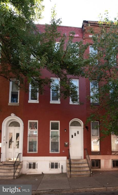 List price to be opening bid. Auction to be held on the premises and online simulcast Friday, October 25th @ 1:00pm. Brick Porchfront Townhome in the "Druid Heights" Neighborhood Of Baltimore City. Improved by a 4 bedroom, 2 and a half bath porchfront brick townhome. Features include:Partially finished lower level with full bath and ample storageWood type floors, Fenced in backyard, Gas forced hot air and more!