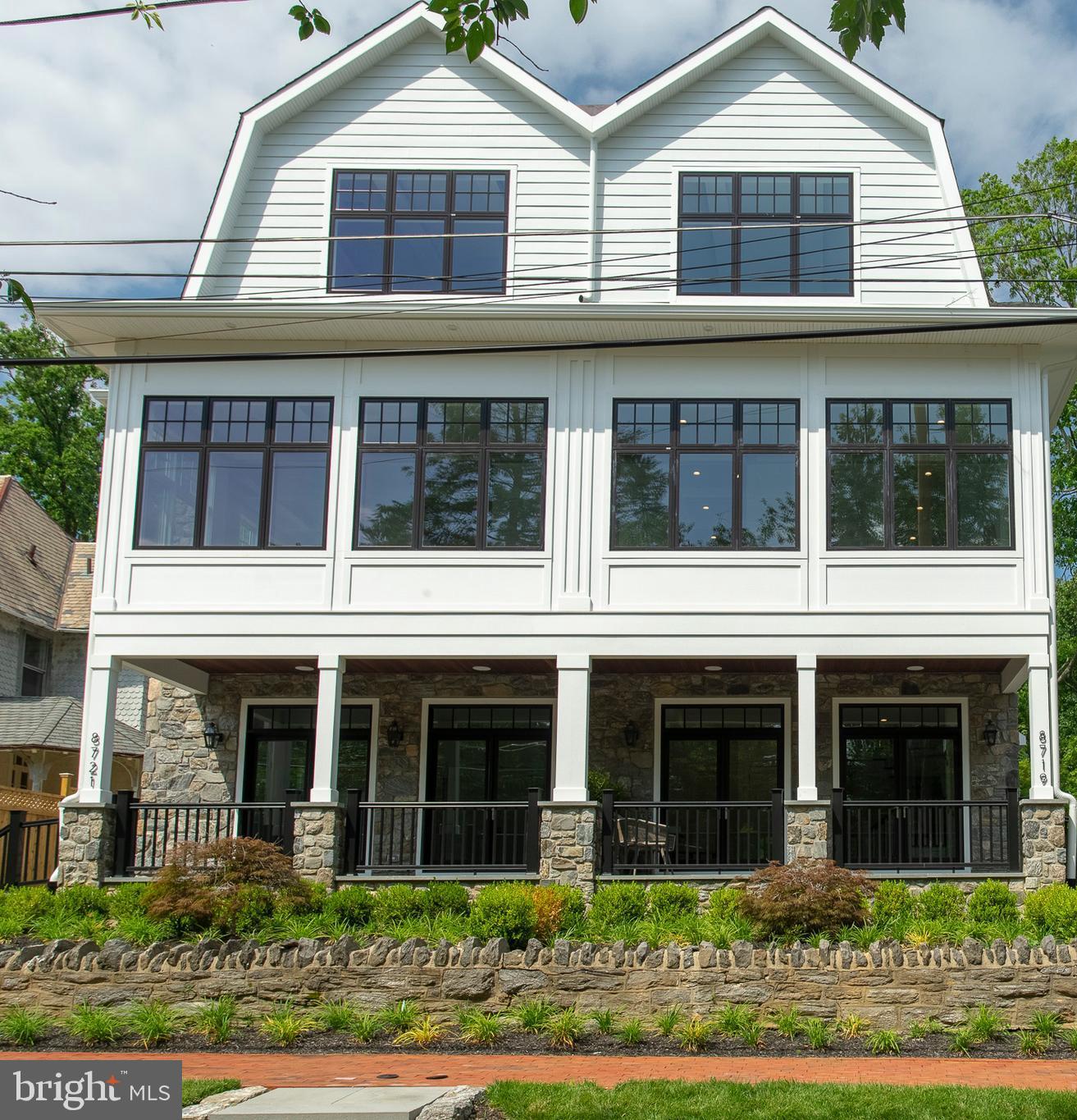 Welcome to 8719 Shawnee Street - Traditional architecture coupled with a modern floor plan make this 4 BR/3.5 BA townhouse perfect for today's lifestyle. Developed and built in 2018 by local premier builder/developer, Main Street Development. With almost 3000 square feet of living space, this lovely home nestles perfectly into the neighborhood. Enter into a grand foyer with gorgeous custom in-laid marble and dark oak floor replete with custom built-in bench and cubbies. The 4th bedroom, which is currently used as a home office features custom built-ins and French doors opening out to a lovely front porch with mahogany ceiling and a connecting full bathroom, is ideal for today's work from home environment. Access to a convenient 2-car rear attached garage. Ascend to the second floor which is a fabulous open-concept living floor with over 1200 square feet of living space and dramatic 10 foot high ceilings. Large Chef's Eat-in Kitchen with 10 foot island with calacatta quartz countertops, Sub-Zero/Wolf appliance package, 59" custom cabinets, extensive built-in pantry cabinetry, chic navy blue island and bar area perfect for entertaining. Step-out balcony. Large dining room with dramatic custom millwork. Massive living room with coffered ceiling and custom walnut open-shelving features tranquil views of classic stone Chestnut Hill houses and leafy trees through walls of huge windows. Convenient powder room. Upstairs enter into a fabulous Main Suite in the front of the house with vast open views. En-suite Bathroom features a step-in steam shower with frame less glass door, custom double vanity and radiant-heated floor. Main Bedroom with custom mill work and tray ceiling, custom plantation shutters and a large walk-in closet with custom built-in closet system. 2 additional Guest Bedrooms on the opposite end of the floor with a full bathroom plus a convenient laundry room with side-by-side washer/dryer, countertop and storage cabinetry complete this floor.
Located on a quiet side street yet just a short walk to the shops, restaurants, cafes and markets on Germantown Avenue, train lines and Fairmount Park trail entrance. 7 years remain on the 10 year property tax abatement and many green features make this fabulous home very efficient and low maintenance. 25 minutes to Center City, easy access to the suburbs and major highways. Premier location-Exceptional Quality-Perfect Size
** Please note that the photos used were when the home was newly built and listed in 2018**