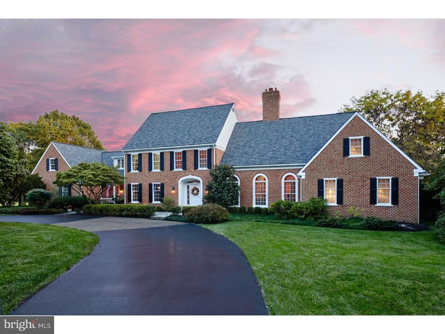 Offered for the first time, a custom built, one-of-a-kind Willistown estate property. With timeless styling & very special understated elegance, this home combines elements of traditional Chester County style with a subtle hint of Southern hospitality. Situated in the heart of Radnor Hunt Country, yet just a few minutes from downtown Paoli... Welcome to your own "Corner of the Country". This much-admired property sits on a beautiful four acre level lot, complimented by an inviting circular driveway and expansive grounds with mature plantings. Thoughtfully designed by Ann Capron to capture sunlight from southern exposure, the interior is warm & inviting. The stunning two-story, front-to-back foyer welcomes guests. Gracious formal fireside living & dining rooms flank the foyer, and can comfortably accommodate grand-scale entertaining. The chef's kitchen has granite counter-tops and is well appointed with top-of-the-line appliances & a wet bar. The adjacent breakfast room is perfect for casual meals & relaxed entertaining with flow to the flagstone terrace. The family room's spectacular "wall of windows" includes two sets of French door sliders to the patio & pool area. The family room has a cozy wood burning fireplace & the adjacent private study has a gas fireplace; both the family room & study have handsome custom built-ins. The first floor master suite with spa-like bath creates an easy & carefree lifestyle for homeowners seeking the option for single floor living. The entire first floor is highlighted by graceful curved archways & fine mill work; rooms are generously but comfortably proportioned. The second floor - accessed from either the front or back (turned) staircases - offers four more bedrooms & three full baths, two of which are en suite. The fifth bedroom offers flexible living space that can be purposed for your needs - as a bedroom or a sitting room (with pull-out couch for guests), or as an office or computer/homework room. The casual "family" entrance was well-designed with a covered porch entry, walk-in closet/mudroom, first floor laundry room, inside access to the 3-car garage & convenient back staircase. Integrated indoor/outdoor living spaces with an expansive flagstone terrace and salt-water pool nestled within brick privacy/sitting walls. Nearly-new 50-yr Grand Manor Roof, whole-house generator. A turn-key opportunity for the most discerning buyer.