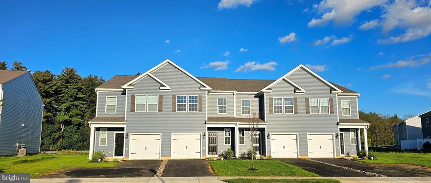 Great opportunity to be the first to live in this brand new corner townhome with 3 bedrooms & 2.5 baths. Enter into the main level, where you'll find open floor plan flowing through with lots of natural light. The kitchen features lots of cabinetry, Huge center island, Granite counter top, garbage disposal, Stainless steel appliances, including built-in microwave. The dinning area & Family room has open view towards the back. The Half bath, Pantry and entrance from the garage completes the first floor. Moving upstairs is where you will find the primary bedroom with a sizable walk-in closet. A full bath boasting a double vanity and a walk-in shower. This level also hosts two additional bedrooms, each with ample closet space, and a full bath . The laundry room on this floor adds convivence to the home's practical charm. The community also features wonderful amenities including a playground and open space. The  location is truly unmatched with close proximity to major highways and nearby cities such as Allentown, Easton, Bethlehem and the overall Lehigh Valley. Enjoy an abundance of shopping, restaurants, fitness and lifestyle activities, theater venues, farmers markets and much more! Local attractions include the beautiful Lehigh Valley Zoo, Crayola factory, Dorney Park and many more! All your everyday needs can be met by taking a quick drive to nearby Wegmans, Whole Foods, Target, Giant supermarket and more.