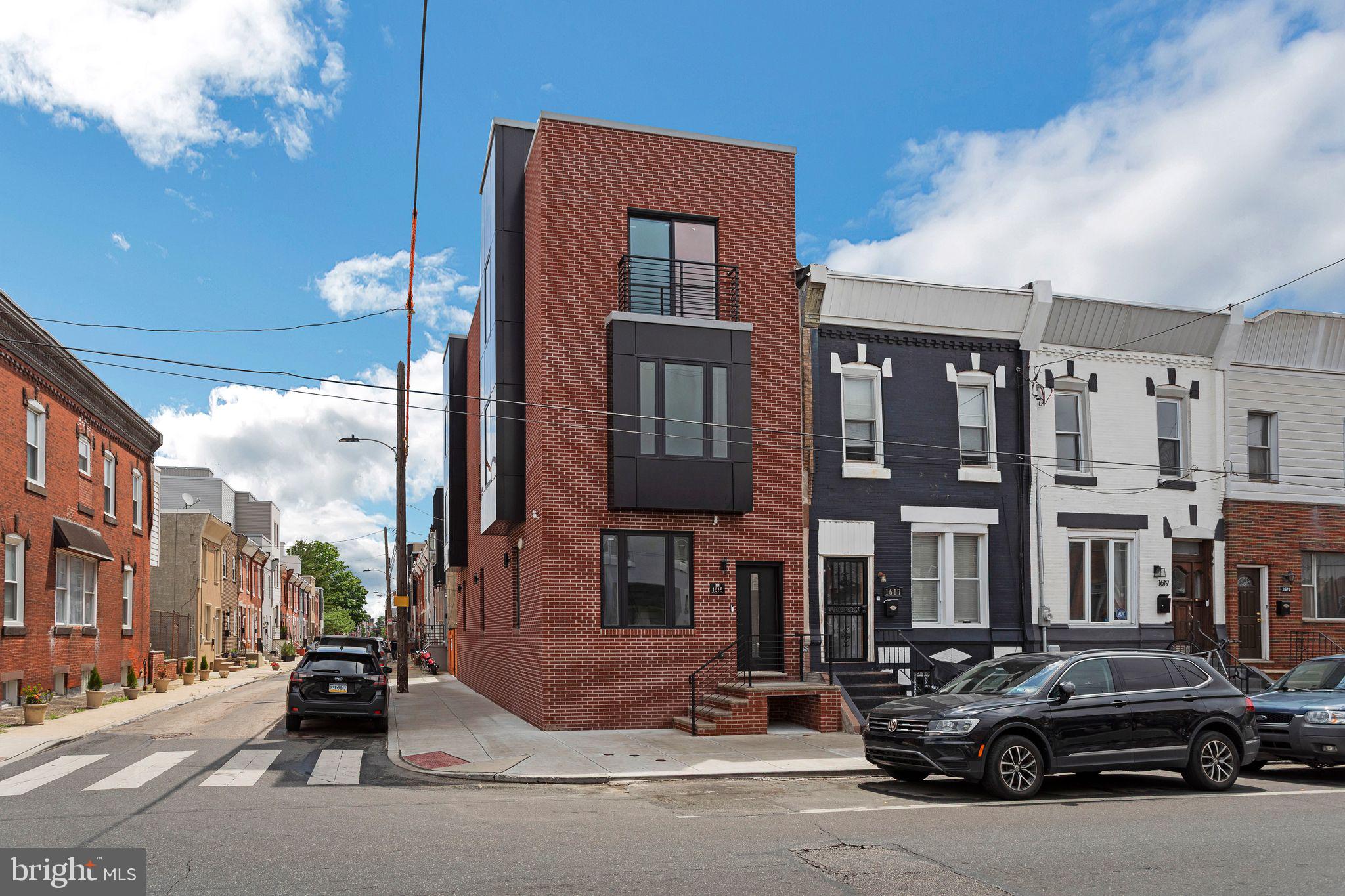 Welcome to this pristine home with all the latest bells and whistles. Located in Point Breeze, this home has every upgrade waiting for you! Tastefully chosen design elements are on each floor to include wide plank engineered hardwood floors and a Google Hub to monitor cameras and thermostats on every floor. The kitchen exudes lavish ocean blue cabinetry highlighted by gold hardware. High end appliances and quartz counter tops add to the grandness of this space. Outside the kitchen is a space surrounded by a Japanese wooden fence great for grilling BUT also a parking space - a rarity in this area! Downstairs has a spacious bedroom (or another living area if you choose) plus a full bath. The second floor has two bedrooms and a full bath but the best is yet to come! The third floor is dedicated entirely to the master bedroom and bath! Before you enter there is a wet bar and refrigerator for snacks and beverages. A huge master bedroom with two walk in closets, one with custom drawers are part of this space. But the master bath is a true oasis. Note the high end vanity with large tiles to match the shower plus a smart toilet with bidet. It is the height of luxury, having rain-like water that pours upon you from directly overhead in the shower. You deserve it! But one more area awaits. Head upstairs to the rooftop deck! Warm weather is here and it's time to spend the mornings with coffee or late afternoons enjoying the skyline of the city! Once you step inside this home, you won't want to leave!