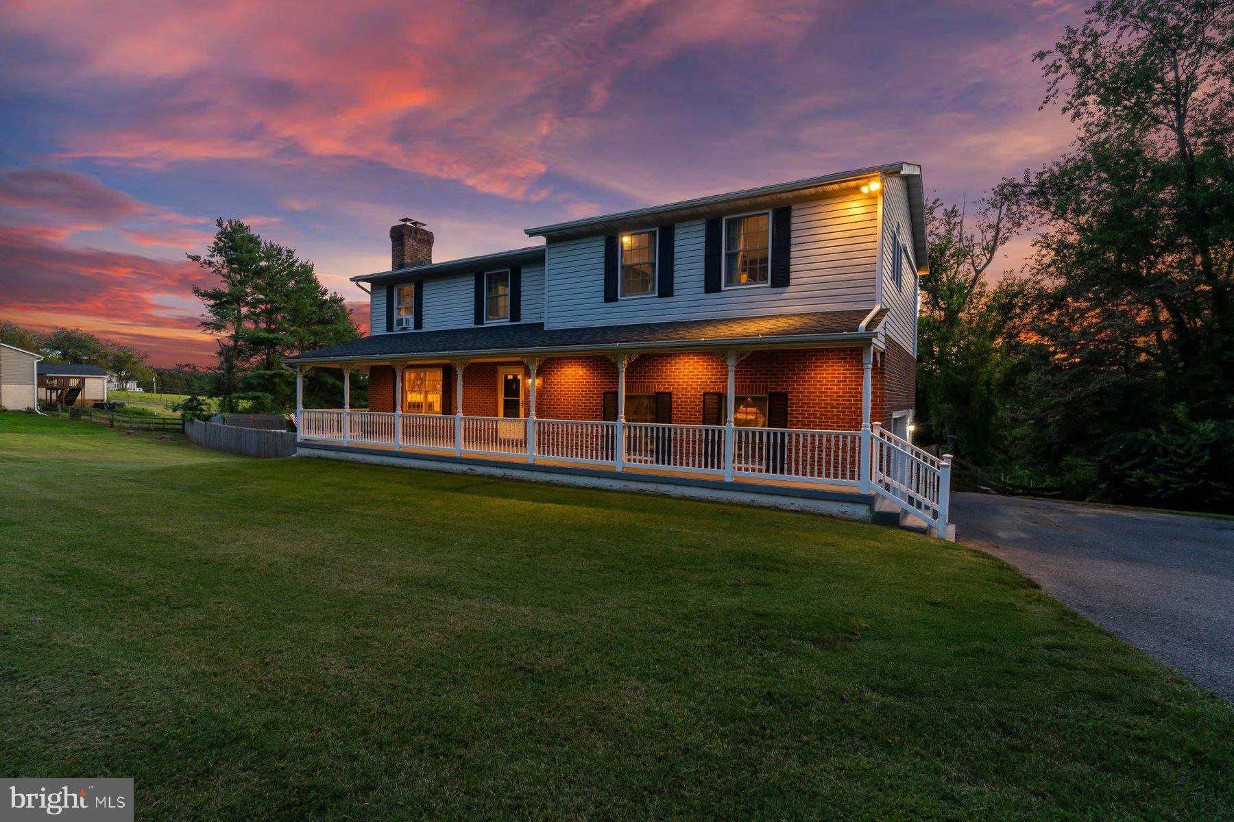 Welcome Home to a Lovely Retreat in the Hereford Zone! This beautifully updated 5-bedroom, 3.5-bath home is your private oasis, complete with a brand-new in-ground pool and patio (2024)—perfect for relaxing and entertaining. Step onto the expansive covered front porch and enter through a welcoming foyer that flows into the elegant dining room with a cozy wood-burning fireplace. The open-concept kitchen and dining area features a walk-in pantry, ideal for home chefs and families alike. Enjoy the spacious family room with vaulted ceilings, skylights, and direct access to a new maintenance-free deck—seamlessly blending indoor and outdoor living. The fully fenced rear yard is a private paradise, boasting fresh landscaping, a shed, and your sparkling new salt water pool and patio. Upstairs, you'll find five generously sized bedrooms, including a luxurious primary suite with a large walk-in closet, jetted soaking tub, an updated walk-in shower, and dual vanities. A second bedroom offers an en suite bathroom with a stunning updated walk-in shower. Three additional bedrooms share a beautiful hall bath with tub/shower. Enjoy brand-new hardwood flooring throughout the upper level and fresh paint. The finished lower level features a spacious recreation room with new carpet. The slider door allows plenty of natural light and opens directly to the patio and pool area. Laundry room on main level with shelving and cabinets. Two car oversized garage & mudroom. All new kitchen ss appliances 2024, New flooring upper level, new hardwood flooring in lower level, New HVAC 2023, New Deck 2024, New mini split in primary suite 2024. Excellent location and schools!