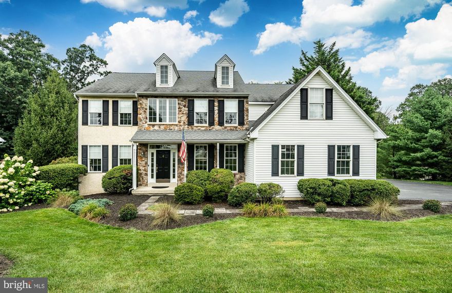 Welcome to 1425 East Woodbank Way in the desirable community of Ryerss Hunt! This beautiful 5 bedroom, 3.5 bath home is the largest model built by one of the two developers, and sits on a premium lot with extra space in the rear and on the side, creating a very private back yard. From the spacious front porch, step into the two-story foyer and access the living room/home office with french doors and the large formal dining room.   The main floor includes a second office/den with sliding doors to one of the rear composite decks; the expansive great room with vaulted ceiling and fireplace; and the kitchen with abundant cabinetry and sliders leading to the second composite rear deck. Also on the main level is a half bath, a very large mudroom with convenient side entry from a second porch, and access to the two-car garage. Upstairs, the owner’s suite includes an enormous walk-in closet/dressing area, a second walk-in closet, a convenient laundry room, and en suite bath. Three additional bedrooms and a second full bath complete the upper level. The finished walk-out lower level adds incredible versatility, with a brand new handcrafted live-edge wood bar with included icemaker, dishwasher and sink, plus plenty of space for a pool table, media area, or play zone.  You'll also find the fifth bedroom with en suite full bath and walk-in closet, a dedicated exercise or flex room, and ample storage along with direct walkout to the rear yard. Located in a community known for its walking trails and open space, this home is just minutes from Route 202, the PA Turnpike, Exton, West Chester, Malvern, regional rail lines, and all the dining, shopping, and nightlife Chester County has to offer—all within the award-winning West Chester Area School District and with low taxes. Don’t miss your chance to see everything 1425 East Woodbank Way has to offer! Professional photos will be added on 8/13/2025