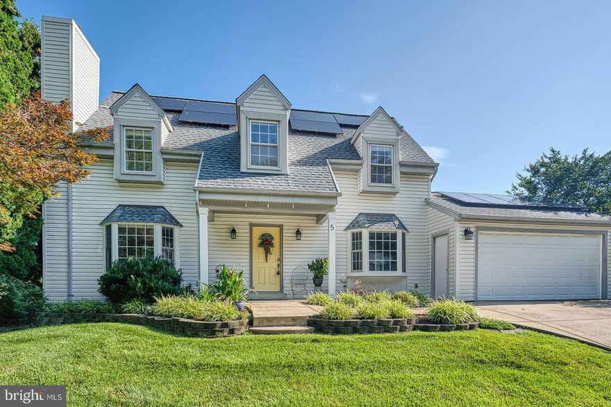 BEAUTIFUL WELL-MAINTAINED CAPE COD situated on almost a half-acre fenced lot on a friendly cul-de-sac in Williamsburg Village. As you enter the home, note the stunning fossilized eucalyptus hardwood flooring that runs through most of the main level. The spacious living room is enhanced by a large light filled bay window. The dining room offers a sliding glass door that opens to a lovely and durable "Trex" deck. The kitchen boasts maple cabinets with a coordinating granite countertop. All appliances are stainless steel and include an awesome large refrigerator. The primary bedroom (can accommodate a king-size bed) sports a large bay window, ceiling fan, fresh paint, and new carpet. The walk-in dressing area grants access to a private bathroom that was renovated with a step-in shower and custom-made cabinetry. Another door leads to an 8-1⁄2-foot walk-in closet. Three additional bedrooms are located on the upper level. All four bedrooms have ceiling fans. Two bedrooms have new carpet. The third bedroom has luxury vinyl plank flooring. All have been freshly painted. A full bathroom completes the upper sleeping quarters. The short closets under the eaves make a fun hideaway for the kids or can be used for extra storage. The lower level family room welcomes you with a cozy wood-burning fireplace, luxury vinyl plank flooring, overhead lighting, and a sliding glass door that leads to the expansive backyard where you will find a large shed to accommodate your outdoor tools and furniture. This level also features a full bathroom, separate closet, laundry room, and storage area. Utilities include a gas furnace, tankless water heater, and central air conditioning. Due to the Solar Panels that are owned - not leased - you will notice a substantial savings on your electric bill. This home is convenient to schools, shopping, and major commuter routes including the InterCounty Connector (ICC). The Glenmont Metro Station is just 7 miles away, and public bus service is available nearby. Come see for yourself all the amenities this home has to offer!