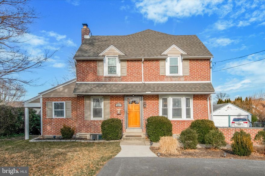 Welcome to this timeless, updated, brick colonial nestled in the heart of Springfield. Boasting traditional charm and modern comforts, this residence offers an ideal blend of sophistication and functionality.
As you step through the front door, you're greeted by gleaming hardwood floors, a beautiful brick fireplace and elegant crown molding. The home office is just a step down off the living room ensuring a separate work from home space. The dining room features a beautiful bay window exuding natural light which leads seamlessly into the functional kitchen. Step down into the expanded den/family room area with a breakfast nook and doors to the large, level, fenced in yard with patio. Enjoy the upcoming Spring season out here with plenty of room for entertaining. 
Retreat to the upper level, where three generously sized bedrooms await. The primary suite offers a peaceful sanctuary complete with a private en suite bathroom with double sinks. A large walk-in closet completes this primary bedroom. Two additional bedrooms and a beautiful, spacious hall bath complete this level. 
Downstairs, the finished basement offers additional living space perfect for a recreation room or media center. Recently updated with new carpet and fresh paint this space also features a full bathroom that could work well for any out-of-town guests. The laundry can also be found here. 
A large, shared driveway offers parking for up to 5 cars. There is room to turn around too so there will never be a need to reverse out of the driveway. 
Conveniently located near local schools, parks, shopping and dining there will always be something close at hand. Easy access to public transit and major roadways including Baltimore Pike, 320 and 476. Whether you're searching for your forever home or a place to create lasting memories, this classic brick colonial is sure to exceed your expectations.