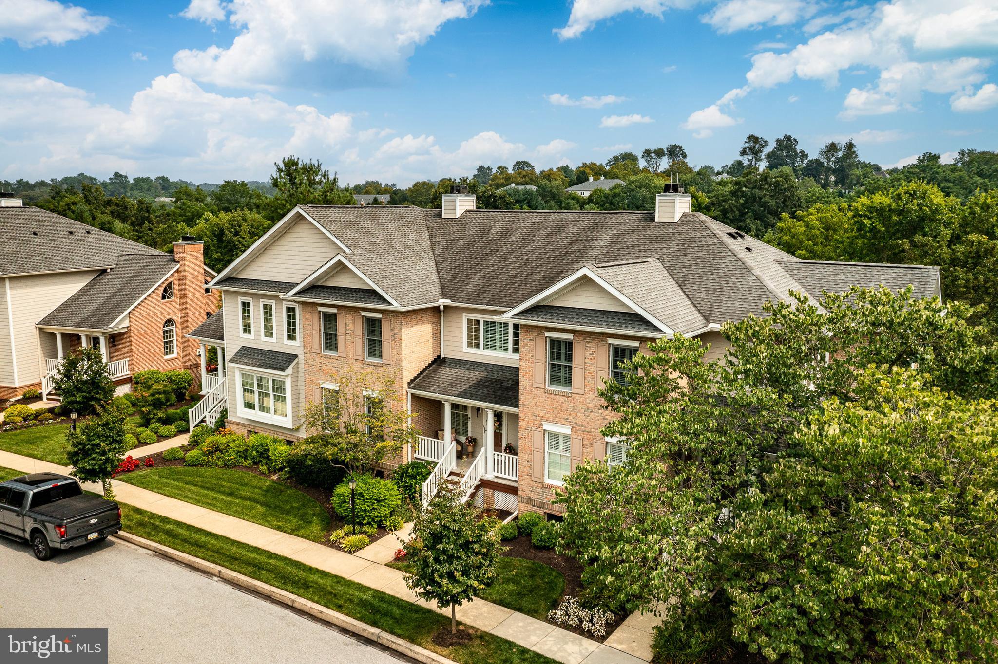 WELCOME TO 547 Gramercy Lane in Eagleville—a beautifully maintained Yardley model townhome nestled in the sought-after Eagleview community! Come discover all that Eagleview has to offer, including a vibrant Town Center with top-rated restaurants, boutique shops, a daycare, and a salon. Enjoy the community fitness center, attend neighborhood events, and take advantage of the open green spaces and miles of scenic walking trails. Step inside from the charming covered front porch and into the spacious main level. The kitchen offers abundant counter and cabinet space and flows seamlessly into the generous dining area and cozy family room, which opens to a private deck overlooking peaceful open space. The first floor also features a formal dining area, a large living room, welcoming entry foyer, half bath, laundry room, and impressive storage throughout. Beautiful built-ins, tasteful finishes, and stylish flooring complete the space. Upstairs, the primary suite includes a spacious full bath and a huge walk-in closet. Two additional well-sized bedrooms—each with ample closet space—and a second full bath complete the upper level. The fully finished lower level provides flexible living space to suit your needs, with a second half bath, direct access to the oversized two-car garage, and a walk-out to the rear of the home—ideal for a home office, playroom, or gym. Eagleview residents enjoy fantastic amenities including a pool, tennis courts, clubhouse, and an active, walkable lifestyle that’s hard to match in Chester County. All of this is just minutes from the PA Turnpike, Exton, Downingtown, West Chester, and more—and located in the award-winning Downingtown East School District!