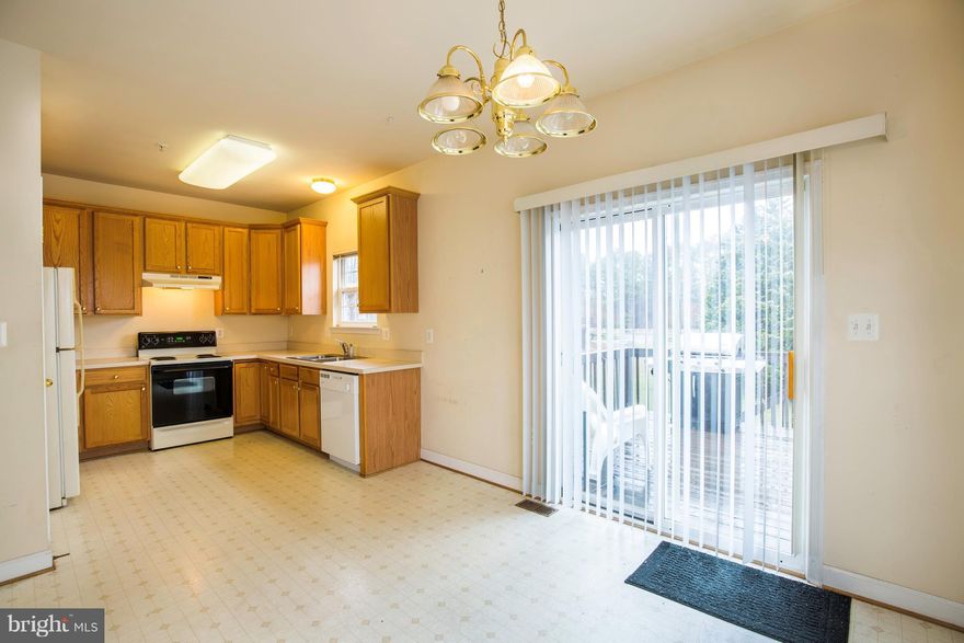 Newer 2000 Sq Ft End Unit Garage Townhouse in waterfront community with beach access for fishing,kayaking, bonfires sparkling w/new paint and flooring.Huge eat in kitchen opens to living/dining areas w/slider to deck. 2 master suites with walk-in closets and two full baths on top level.Second family room/3rd bedroom on main level.9' ceilings, gas heat and hot water, fire sprinkler system. WOW!