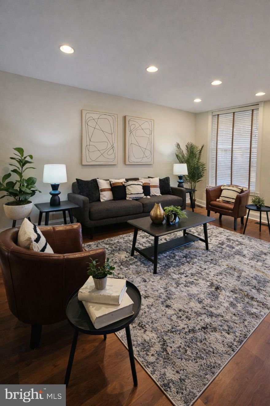 OPEN HOUSE - SAT - JAN 17th - 11am to 1pm - All of this for UNDER $350k in Hampden??? You bet, Hon! Welcome to 4126 Falls Rd - tastefully updated and perfectly positioned in the heart of Hampden, just minutes to The Avenue (36th Street) for dining, shopping, and neighborhood favorites. Start your mornings on the welcoming front porch, then enjoy approximately 1,300 sq ft of comfortable living with an open floorplan that’s ideal for everyday life and entertaining. The gourmet kitchen shines with stainless steel appliances, granite countertops, a breakfast bar, abundant cabinet space, and a separate pantry. Upstairs, you’ll find large bedrooms and baths with great closet space, including a true primary suite. The fully finished walk-out lower level expands your options with a family room, an additional bedroom, and another full bath - perfect for guests, work-from-home, or just extra living space. Enjoy the convenience of a rear parking pad, plus easy access to Wyman Park, the Jones Falls Trail, Woodberry, Clipper Mill, Medfield, Parks and Rec, commuter routes and so much more! Schedule your showing today - Hampden living starts here!