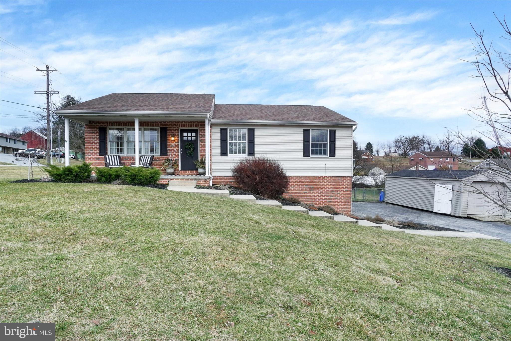 Fantastic 4 bedroom raised rancher on nearly an acre, in Dallastown Schools! The first floor hosts an open layout as you transition easily from the living room into the open dining/kitchen area, where you'll find ample countertop and cabinet space. Access the rear deck from the kitchen, which leads you out into the large fenced in back yard (property lines extend well beyond the fencing, .90 acre lot), and perfectly circular paver patio that is perfect for a fire pit! A finished basement offers extra living room space, with a full bathroom, 4th bedroom and space for storage or an in-home office. Roof, hot water heater and HVAC system have all been replaced within the last 6 years. Location is key for this property, quick access to grocery stores, shopping, restaurants, and walking distance to Nitchkey Field! A few other bonuses - you can hear the high school band from the deck, and will catch deer roaming the street. This is a perfect combination of private living yet close proximity to everything!
