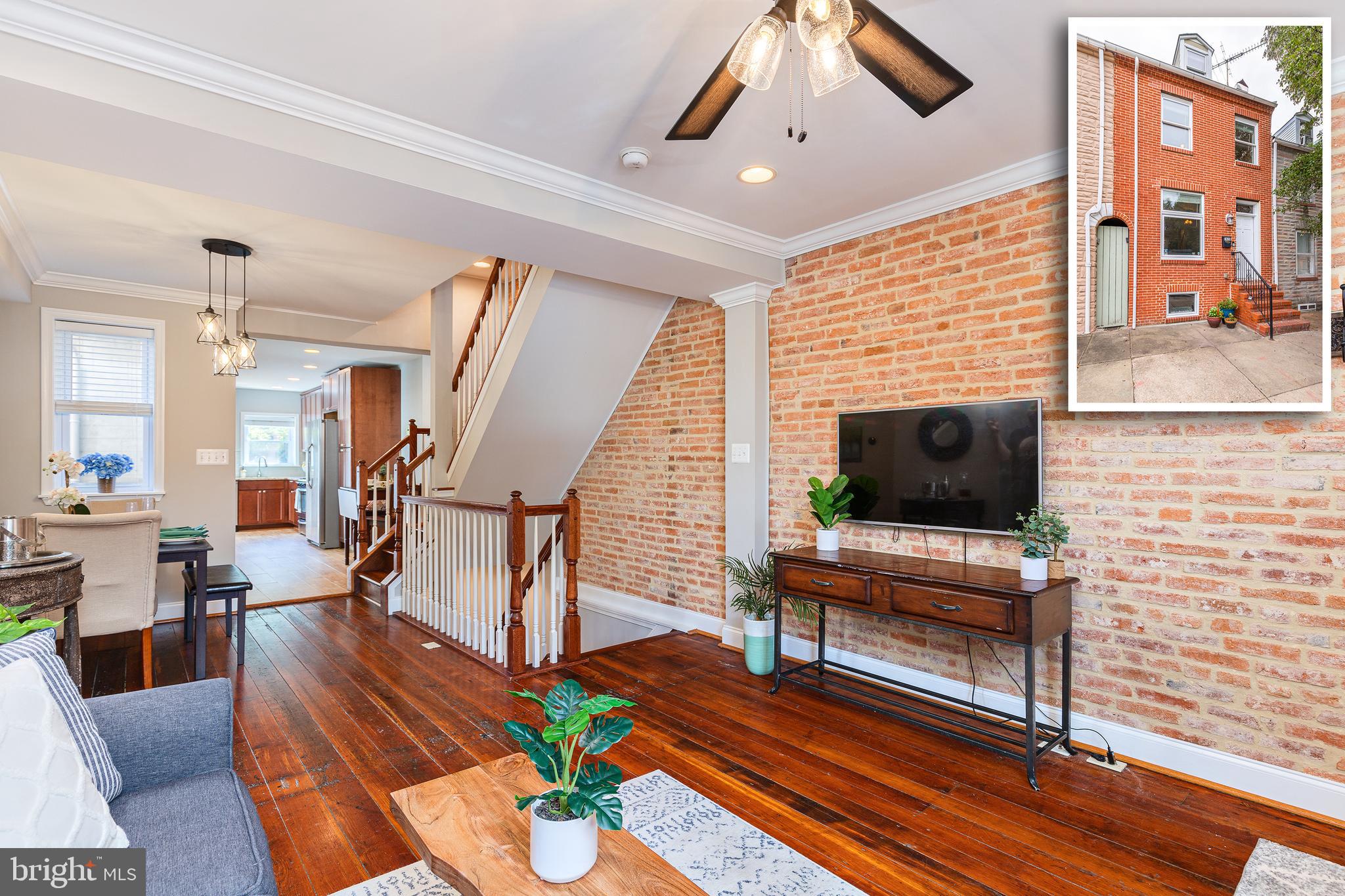 REMARKABLE FELLS POINT HOME W/ 4 FINISHED LEVELS & SPECTACULAR OUTDOOR OASIS - located just steps to all the major Fells Point attractions this 15' wide home features an updated floor plan with original wide plank hardwood floors throughout, fresh paint throughout, crown molding, exposed brick, separate dining area, large kitchen w/ granite countertops, ss appliances, custom cabinetry and new tile backsplash leading to secluded custom stone patio w/ pergola and seasonal ivy great for entertaining. Perfect for roommates or those needing more space the upper level offers 2 large bedrooms with new carpet, luxurious bathrooms with jetted tubs, oversized walk-in closet in owner suite and 3rd floor clubroom w/ wet bar which makes great home office or second living room leading to large rooftop deck with downtown views. The finished walk out lower level has two bright bedrooms, hallway bathroom and laundry room. Well appointed throughout and lives larger than it appears - dual zone hvac system keeps this home comfortable throughout. Check this one out!