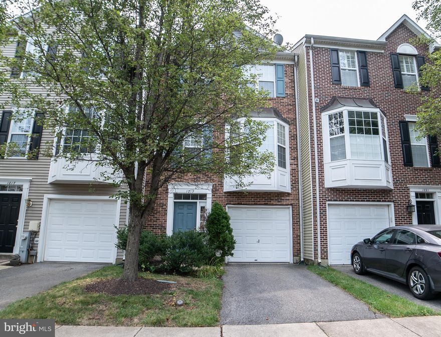 WELCOME HOME!!! ITS TIME TO ENJOY THIS VERY WELL MAINTAINED THREE BEDROOM TOWNHOME WITH A GARAGE.GREAT FEATURES INCLUDE BRIGHT AND SUNNY KITCHEN WITH LARGE ISLAND SPACIOUS CABINETS AND OVERSIZED PANTRY. SLIDING DOORS THAT LEADS  TO A DECK FOR ENTERTAINING.  COZY LIVING ROOM WITH NEUTRAL COLORS AND BAY WINDOW ALSO DINNING AREA . UPPER LEVEL OWNERS BEDROOM AND BATHSUITE INCLUDES SKYLIGHTS,JETTED TUB AND WALK-IN CLOSET.FINISHED LOWER LEVEL FAMILY ROOM WITH HALF BATH AND WOOD BURNING FIREPLACE.CENTRALLY LOCATED NEAR SHOPPING,SCHOOLS,EASY ACESS TO MAJOR BELTWAYS.SELLER OFFERING ONE YEAR HOME WARRANTY. A  TRULY MUST SEE!!!