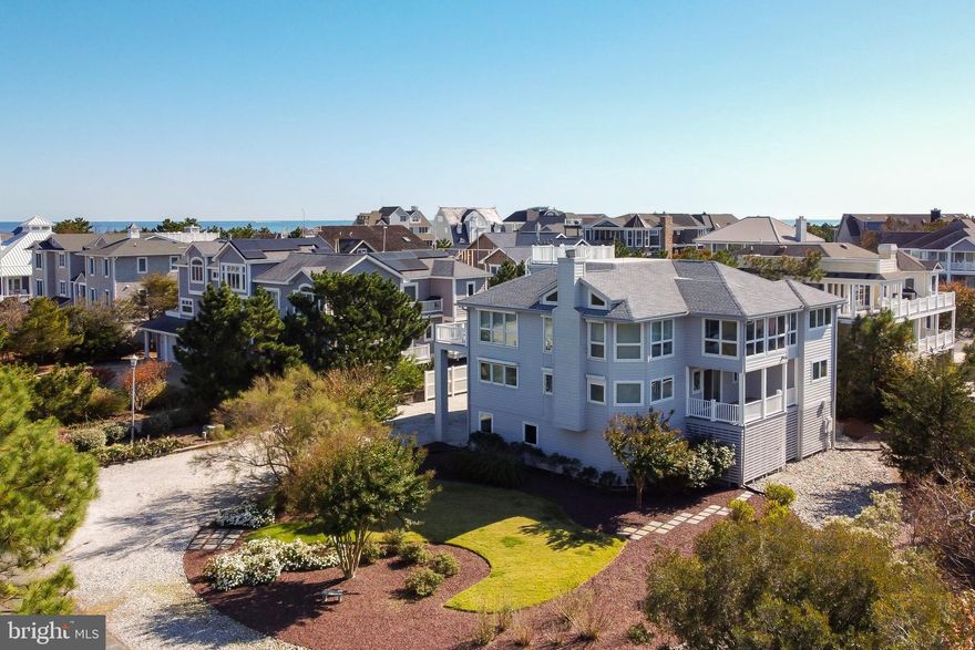 RARE TO MARKET & OCEAN BLOCK! Discover the unbeatable, unique location & privacy of Indian Beach. Stunning and spacious 4-bedroom, 4 full, & 2 half bath beach house situated on a large corner lot sits steps to the Atlantic Ocean in a quiet enclave, offering breathtaking vistas of both the bay & ocean with full panoramic views from the rooftop deck! With an inverted open floor plan that showcases breathtaking ocean and bay views from every angle, you'll be captivated by the natural beauty that surrounds you. Highlights include over 4,000 square feet of living space with a private 3rd level owner’s suite, expansive main living area, 2nd level with 3 additional bedrooms, 3 full baths, secondary living room, and so much more. Nestled just south of Dewey Beach, this coastal property gives you access to the best of the beach: bike to the famed Boardwalk, restaurants and shopping of Rehoboth Beach; enjoy water sports or stroll amid the laid-back fun in Dewey; or cruise south to the Inlet, Delaware Seashore State Park (with new beachfront restaurant!), or the "quiet resorts" of Bethany Beach. Listed at an unbeatable price, being sold AS-IS. From sun-up to sunset, your beach life awaits!