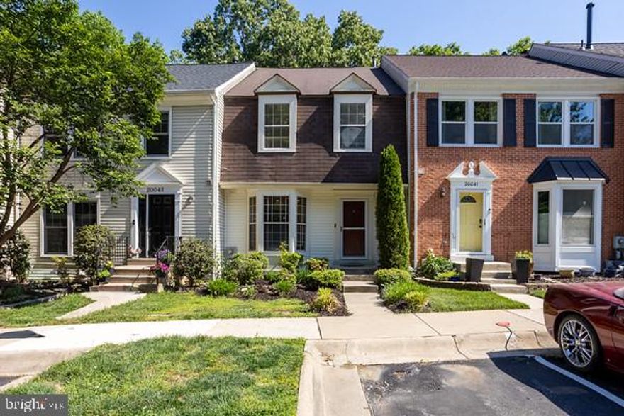 Located in the townes of Water Edge. Brazilian Cherry hardwood floors throughout the main floor. Large deck with lake view and has access to lower level.  Maple kitchen cabinets, bay window, black marble countertops, and stainless steel appliances. Fully finished walk out basement with wood burning fireplace.  Bedrooms with vaulted ceilings.  Two full baths on top level.