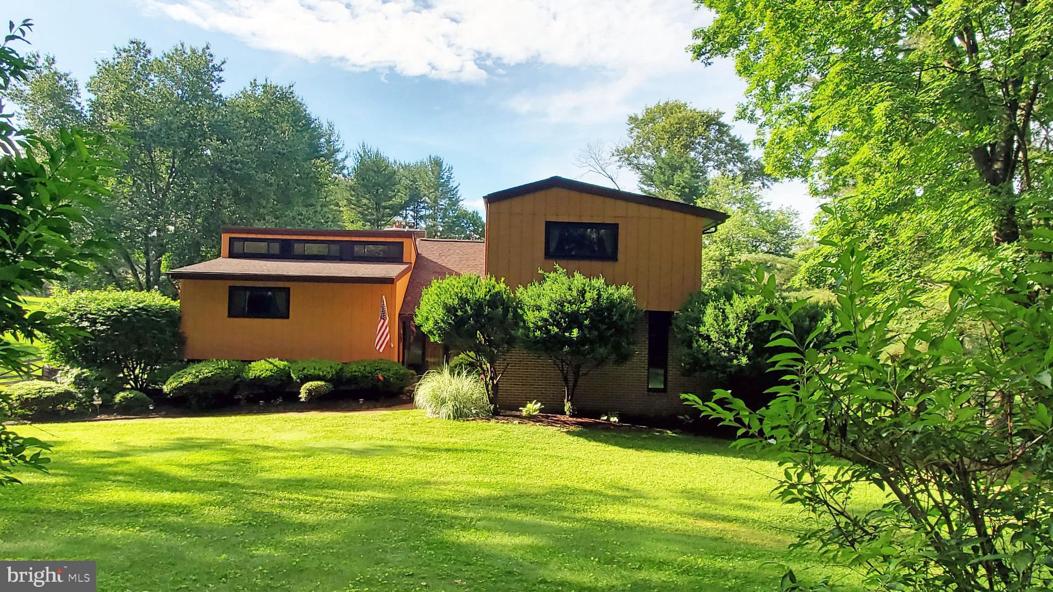 Nestled in the serene subdivision of Glen Elyn, this charming split-level contemporary home offers a perfect blend of comfort and functionality. Built in 1979 and meticulously maintained, this residence boasts an impressive 2,374 square feet of living space, making it an ideal retreat for those seeking both style and practicality. As you approach the property, you’ll be greeted by beautifully landscaped grounds that enhance the home’s curb appeal. The exterior features thoughtful lighting and floodlights, ensuring a warm and inviting atmosphere both day and night. The side-entry 2 car attached garage provides convenient access, while the expansive 1.2-acre lot offers ample space for outdoor activities and gatherings. Step inside to discover a well-designed layout that includes four spacious bedrooms and two and a half bathrooms. The heart of the home is the cozy living area, complete with a wood-burning fireplace with pellet stove insert, perfect for creating lasting memories during chilly evenings. The Family Room has vaulted ceilings as well as sliders that open to a 15' x 8'6" deck with a retractable awning .Large sliding glass windows throughout the home allow natural light to flood in, creating a bright and airy ambiance. The kitchen is a chef’s dream, equipped with Stainless appliances including a built-in microwave, double ovens, and a self-cleaning range. You'll love the thoughtfully designed kitchen with plenty of cherry cabinets, quartz countertops and even a 6'4 x 6' island that can seat 8 and there is still room for an additional table. The island even has storage underneath. Venture downstairs to the partially finished basement, which features a workshop and additional living space, providing endless possibilities for customization. Whether you envision a home gym, playroom, or additional storage, this area is ready to meet your needs. Outdoor living is equally inviting, with multiple balconies and a patio that beckon for relaxation and enjoyment of the surrounding nature. The peaceful setting, located on a no-thru street, ensures privacy and tranquility, making it a perfect sanctuary to unwind after a long day. This home is not just a place to live; it’s a place to thrive. With its excellent condition, thoughtful design, and desirable features, it’s ready to welcome you into a lifestyle of comfort and ease. Don’t miss the opportunity to live in one of the "best neighborhoods" Harford County has to offer. Glen Elyn has 2 ponds - one located on Blythe Ct and the other on Forest Glen Drive. The community has an active community association with it's own board of directors elected by the residents of the community. There is a $75 per YEAR fee that is paid annually for maintenance of the common areas and open space. An added bonus is that the community adjoins the Gunpowder State Park - feel free to walk to the park at Dalton Bevard Dr - only 2 minutes from this home. Price of home reflects the need for new carpeting.