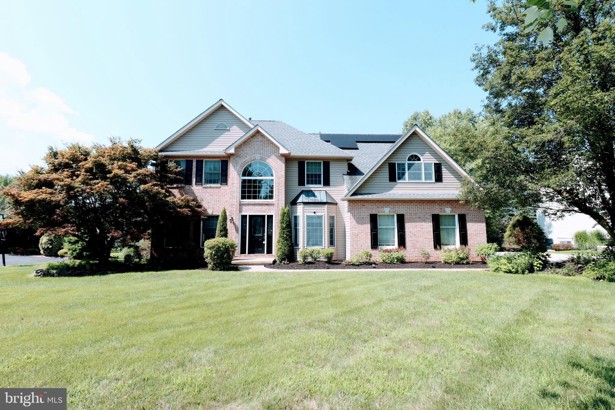 Live your best life in this storybook colonial in Bethlehem Township's beloved Wagner Farms - no HOA, just perks. With 4 beds, 3.5 baths and over 3,700 total sq/ft, there's room for everyone. Hardwood floors throughout, tile bathrooms, and a stylish kitchen that flows into the sun filled family room. Upstairs- Spacious bedrooms and walk-in closets. Downstairs- A fun L-shaped rec room with a bar. a bonus room near the full bath - perfect after pool time! Step outside into your own backyard paradise; a two tiered deck, heated in-ground pool, waterfall, diving board, spa and stunning views. Minutes to St. Luke's, shopping, dining and commuter routes. Come see this one today!
