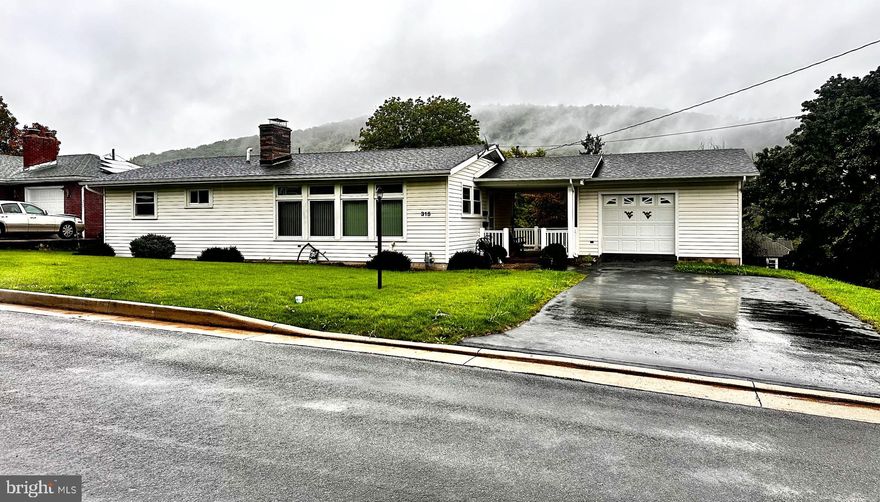 "HEAVEN CAN WAIT"
Feel right at home in this meticulously improved and maintained 3 bedroom, 1.5 bath, 1,300 sq ft vinyl rancher on .22 acre lot overlooking the surrounding mountains. Fully equipped kitchen with new linoleum floors and appliances. Spacious living room offers designer stone brick fireplace, with gas insert, track lighting and picture windows. Beautiful 3" Cherry hardwood flooring thru-out main floor. All bedrooms include huge closets. Remodeled full bathroom with new seated shower and sliding glass doors. Partial basement with washer and dryer included. Detached garage with workbench and upgraded auto door. Covered breezeway. Huge rear entertainment deck with vinyl railings. New 35 yr architectural shingle roof. Perfect starter or retirement home in a choice neighborhood.