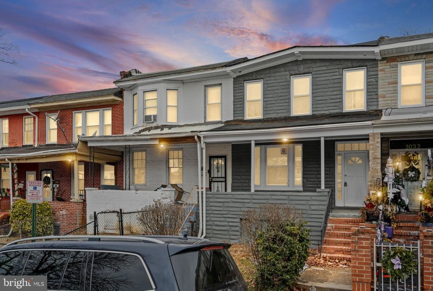 Welcome Home to 3034 Arunah Ave — Move-In Ready 5 Bed / 2 Bath Renovated Rowhome in West Baltimore. Step inside a fully transformed 5-bedroom, 2-bathroom home where every system is new and every finish is fresh. This isn’t a flip with cosmetic upgrades — it’s a permitted, top-to-bottom renovation built to last, with brand-new HVAC, water heater, plumbing, electrical, and appliances throughout.
Main Level — Designed for Real Life A bright, open-concept living and dining area greets you with new flooring and recessed lighting throughout. The modern kitchen features sleek cabinetry, durable countertops, and a stainless steel appliance package. The standout: a full bedroom and full bathroom on the first floor — perfect for guests, in-laws, a home office, or single-level living.
Upper Level — Room for Everyone
Generously sized bedrooms with ample closet space — true 5-bedroom flexibility, not converted hallways. Updated full bath serves the upstairs.
Lower Level — Bonus Space That Pays You Back. A finished walkout basement adds real, livable square footage: rec room, home gym, media space, or a 5th-bedroom/office combo. The walkout access opens directly to your private fenced backyard.
Outdoor
Fully fenced rear yard for entertaining, gardening, kids, or pets. Quiet, residential block.
Location You’ll Actually Use
    •    5 minutes to Coppin State University and Mondawmin Mall
    •    Near Grace Medical Center
    •    West Baltimore MARC station — direct commuter rail to DC
    •    Gwynns Falls / Leakin Park trails minutes away
    •     3 miles to downtown Baltimore and major commuter routes (I-695, US-40, MLK Blvd)
Buyer Incentives Worth $20,000+
This home is located in a Buy Back the Block grant-eligible area — qualified buyers can receive $15,000 (purchase) or $20,000 (purchase + renovation) in non-repayable grants. Stack with the First-Time Homebuyers Incentive Program.  Incentive Program ($10K–$20K), Maryland Mortgage Program (MMP), CDA loans, or employer programs like Live Near Your Work (UMB, Johns Hopkins, City employees). Buyers in this corridor have stacked $20,000+ in combined assistance. Ask your lender — this could mean buying with as little as $1,000 down. This home won't last long, come tour tour.
