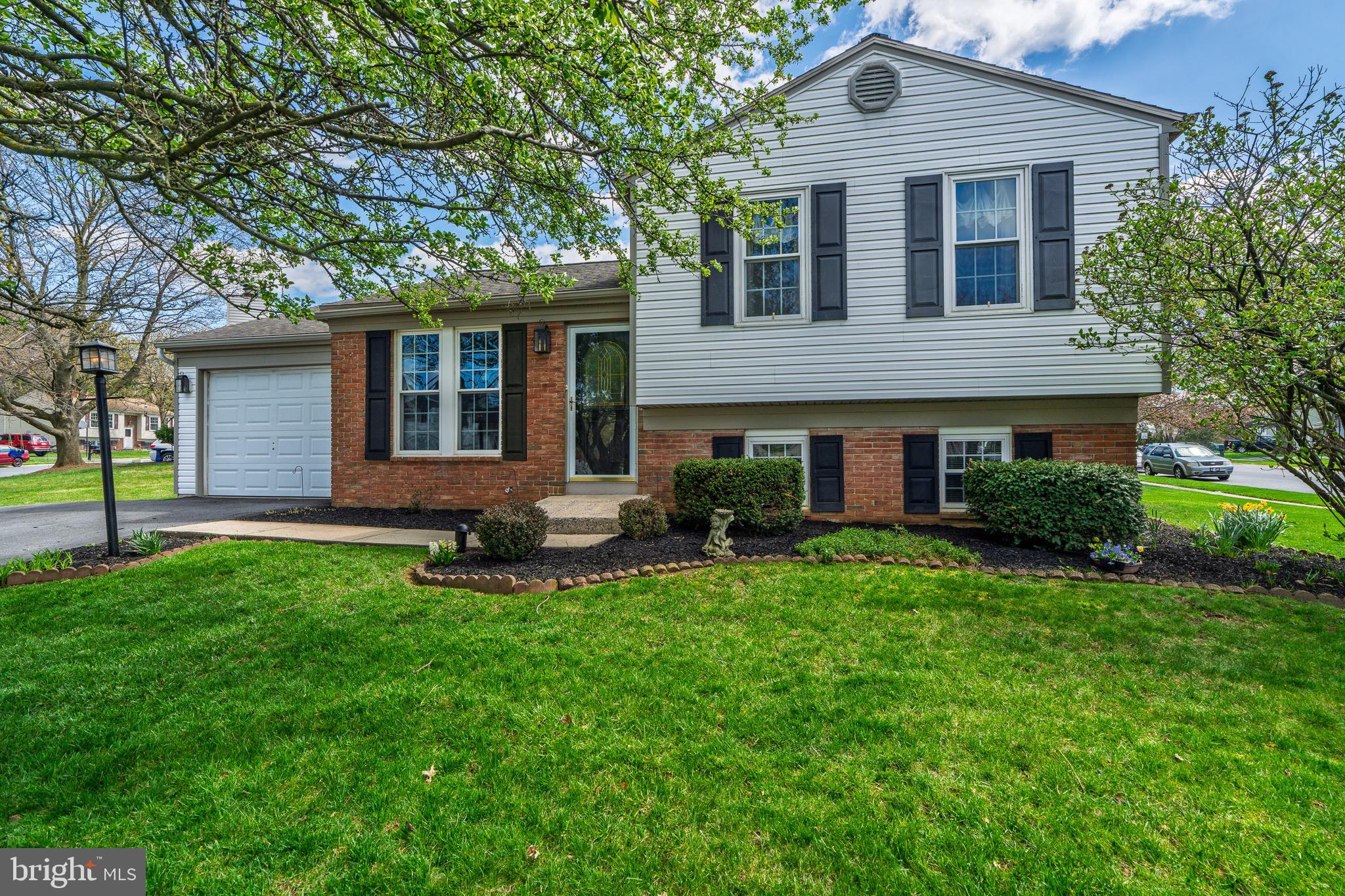 This charming, freshly updated split level home offers a perfect blend of comfort and style. Situated in Manheim Township's popular Village Park neighborhood, it features a bright, open concept living area with new flooring, fresh paint and large windows that flood the space with natural light. The kitchen has been tastefully renovated with brand new butcherblock countertops, stainless-steel appliances and lighting fixtures. The versatile family room addition is highlighted with a vaulted ceiling and a wood stove, perfect for those cold nights. This large, open space is ideal for family gatherings, relaxing or entertaining. Upstairs you will find the spacious primary bedroom with walk in closet, a second bedroom and a full bath. The lower level provides yet another family room and the third bedroom. The laundry and half bath can also be found in the lower level- the bathroom has plumbing in place to easily convert to a full bath by adding a shower. Outside, a nicely landscaped lot and rear deck make for easy outdoor living. Move-in ready, this home is perfect for those seeking both comfort and convenience. The sidewalk lined neighborhood provides easy access to Manheim Township Park and Weaver Field, just steps away. Schedule your visit before it's too late!