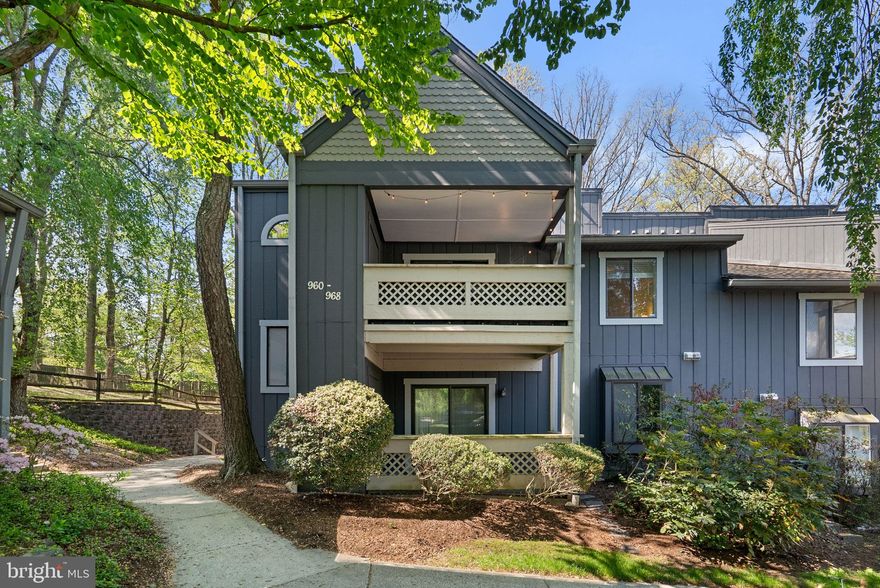 Welcome home to Windbrooke, a contemporary style condo community, perched atop a hill among the woods! Here you'll find convenience of location near commuter routes, access to myriad dining and entertainment options, and all the peace of being surrounded by nature's beauty. Access to the community pool and Blohm Park are pleasant bonuses. This rarely available upper level, 2-story loft unit, with lower level entry/foyer, is ready for a new steward. Enter at ground level to a spacious landing area, great for coats, shoes, and leashes, then head on up to the main level. Here you'll find the newer kitchen with stainless appliances, refreshed cabinets, ample countertops and a pass-thru to the dining area. Beyond the kitchen, space opens into the living and dining rooms where you'll enjoy the views featuring a decorative fireplace and large sliding glass doors, for balcony access, before heading down the hall. There you'll find your in-unit, full-size, washer and dryer, full bath and one bedroom thoughtfully separated from the main living areas. Next, discover the loft level where the primary bedroom, with en-suite bath, overlooks the living room and imagine your peaceful dreams. Come tour your new home today!