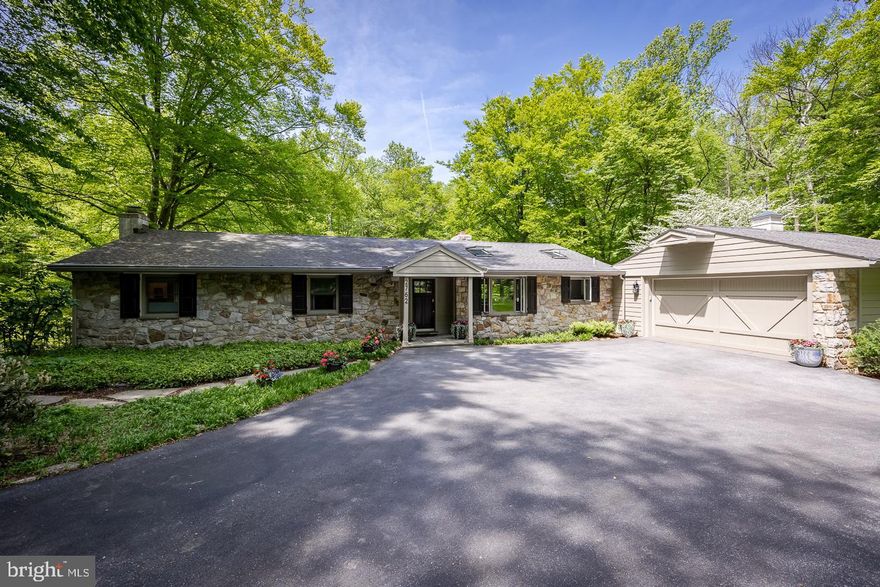 An extraordinarily tranquil and private setting provide the backdrop for this stunning home and property with breathtaking views in every direction. The beautifully landscaped property features abundant open space for outdoor activities with outstanding views of Birch Run Stream and the surrounding woodlands.
The home’s welcoming foyer leads to the gracious family room with natural light showcasing the hardwood flooring and beautiful stone fireplace with access to the expansive deck overlooking Birch Run. The bright and spacious dining room also features hardwood flooring, a stone fireplace and access to the deck. The family room and dining room are open to the beautifully remodeled gourmet kitchen and butler’s pantry. The kitchen features granite counters, abundant custom cabinetry, a large island with a prep sink and second dishwasher, a bay window with seating and top of the line appliances including; a custom paneled fridge, six-burner propane cooktop with paneled drawers, and two ovens. The butler’s pantry provides additional cabinetry for storage, a wine fridge and convenient access to the attached two-car garage. The main floor also features the gracious master bedroom and en-suite bath, a second bedroom (currently a home office) and a second full bath. The master bedroom has hardwood flooring, a fireplace with built-in cabinetry and private access to the deck. The beautifully renovated en-suite bath features a glass-enclosed shower with marble walls and tiled floors, a soaking tub, a marble-topped double vanity sink and a water closet. The spacious lower level features a second family room with a beautiful brick fireplace and convenient access to the brick patio overlooking the backyard, two additional bedrooms with walk-in closets, a beautifully renovated full bath and a potting shed/mud-room with access to the backyard.
Once you step outside…WOW! The large deck is perfect for entertaining friends and family or to simply relax and enjoy the breathtaking sights and sounds of glistening Birch Run and all that Mother Nature brings your way. Cool off in the beautiful salt water pool on hot summer days or relax under the cover of the convenient pool house.  Please make your appointment today to visit this exceptional home and property.
For the outdoor enthusiast, West Vincent Township offers endless opportunities for cycling, nature walks, horseback riding, fishing and birdwatching. A very tranquil setting, yet convenient to premium shopping and major commuting routes (76, 202, 422, 100).
