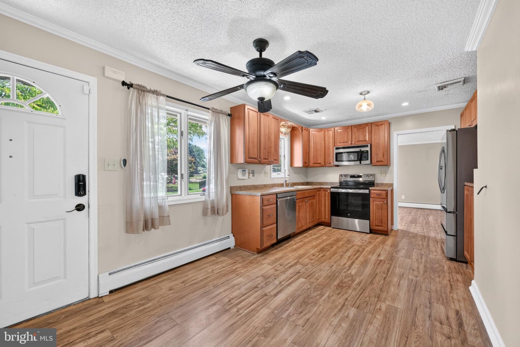 Photo of 45 Schoolhouse Lane, LEVITTOWN, PA 19055 (MLS # PABU2129756)