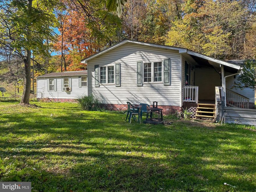 Hidden away in Shanks, WV! Just a few miles from the Town of Romney, this 3 bedroom 2 bath mobile home has been added onto with a stick built addition. Situated on just over 1 acre with a stream fronting the property.  Call to See!
