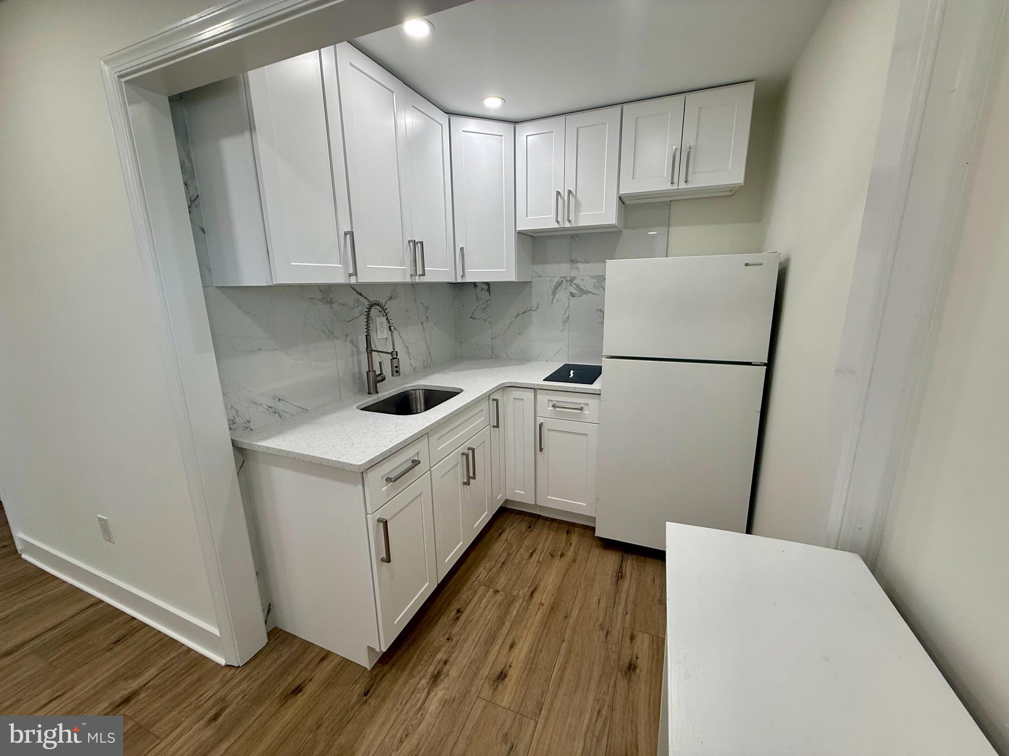 : : Step into the charm of 213 Hermitage Street, Unit A, in the vibrant Manayunk neighborhood of Philadelphia. This fully renovated studio offers an open-concept living area, perfect for those who appreciate smart, efficient spaces. Enjoy the perks of having heat and electric included, making life a bit simpler. The kitchen features a refrigerator and a new compact stove, while the bathroom invites relaxation with a soaking tub. Additional shared storage is available in the basement for your convenience. Pets are welcome here, making it a truly pet-friendly oasis. You'll have plenty of room to create your ideal home. Don't miss out on this opportunity to live in style and comfort in a prime location!