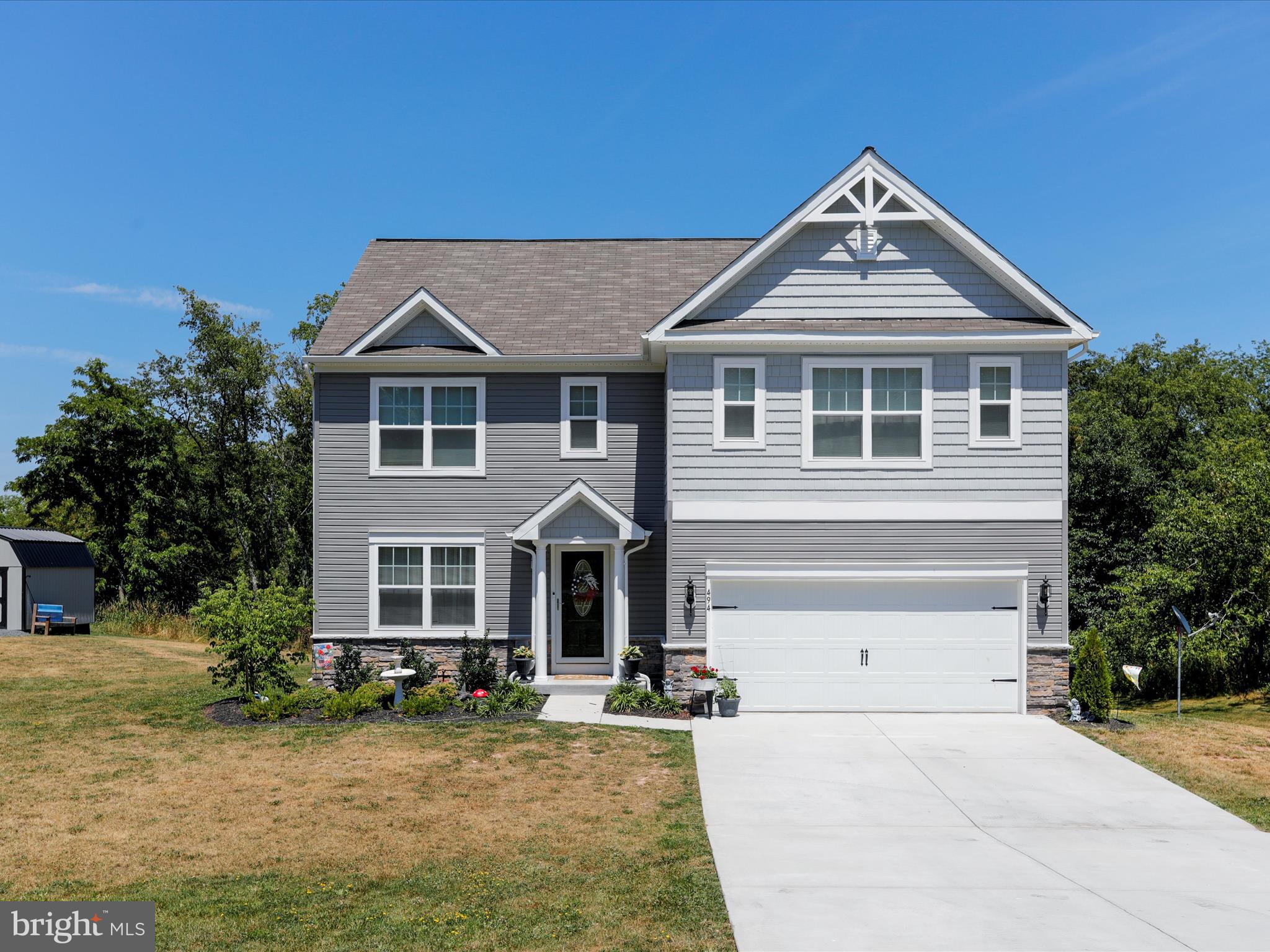 This stunning colonial home, built in 2022, is nestled in the sought-after Harvest Hills neighborhood. Boasting 4 spacious bedrooms and 2.5 baths, the home features a plethora of upgrades including modern appliances, stylish French doors, and enhanced fixtures throughout. The exterior offers a large deck, a concrete patio, and a convenient storage shed, perfect for outdoor activities and storage needs. Ideally located close to essential amenities like schools, stores, and a hospital, this home is a perfect blend of comfort, style, and convenience. This is a must see. Schedule your tour now before it is too late!
Upgrades include upgraded appliances, front door, screen door, French doors in basement and back door to deck, ceiling fans, shower heads, faucets in kitchen, kitchen and dining room lights, door pulls on cabinets in kitchen and bathrooms, chair rail in half bath big deck, concrete patio under deck and storage shed.