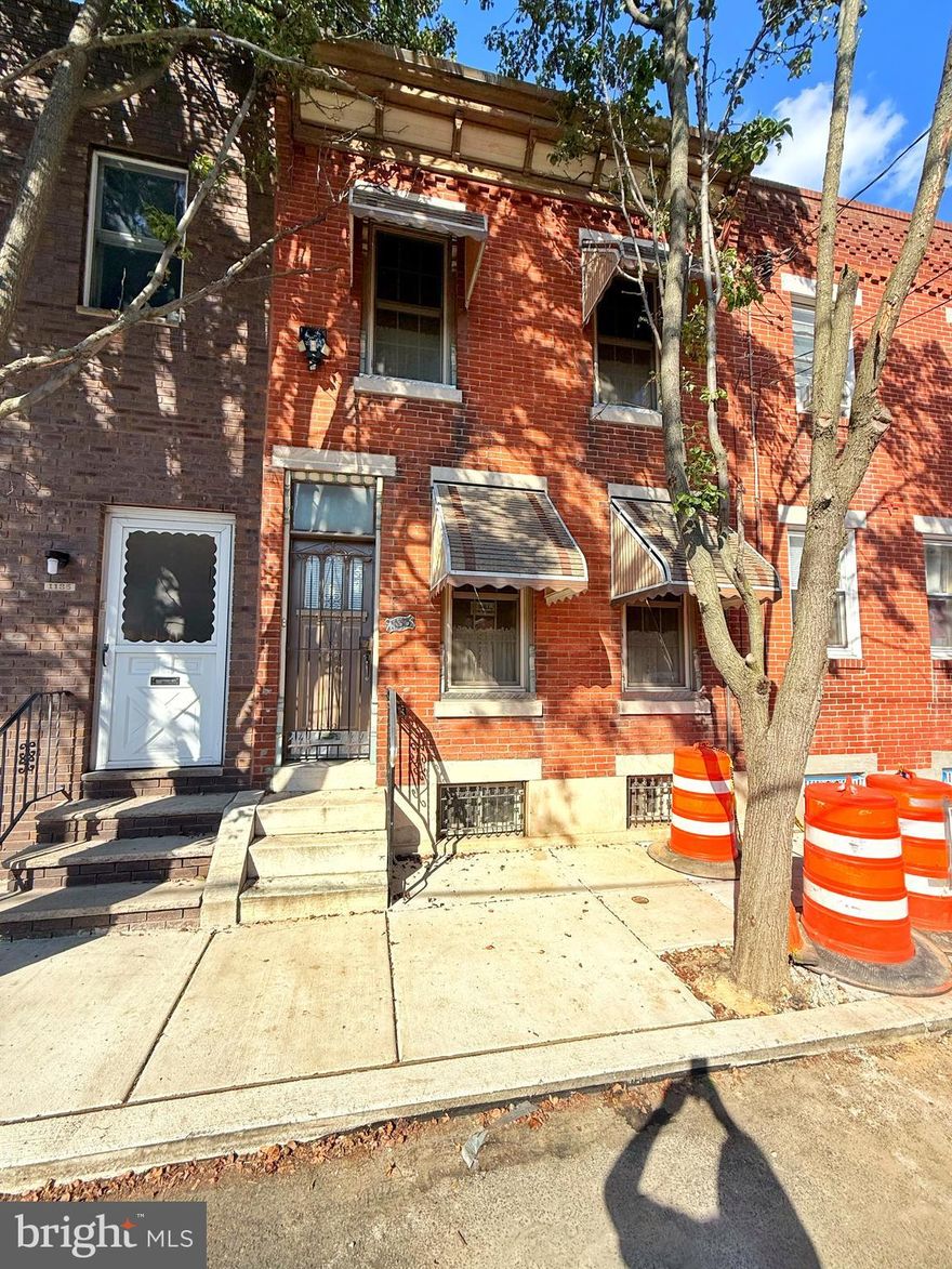 Welcome to this lovely 2 bed. 1 bath home on one of the quaintest blocks in the Lower Moyamensing neighborhood of South Philadelphia. This home has a bunch of old world charm, original hardwood floors throughout, tons of original details. Enter the front door into a spacious living room reminding you of grandma's house when you were a child. Original hardwood floors really add extra charm. On the way to the kitchen is a formal dining room fit for a family. As you walk through the french doors you will discover a full eat in kitchen with plenty of cabinets and stainless appliances. Just beyond here is a small yard for some outdoor space. The basement is clean and dry and offers a ton of storage along with your washer & dryer and mechanicals of the home. The 2nd level boasts 2 comfortable bedrooms with ample closet space nicely finished off with hardwood floors. On this level is a  spacious full tile bath with a jetted tub for your pleasure. This location is a short walk to the subway at Broad and Snyder and the bus routes are just feet away on the corner. You can walk to East Passyunk with ease and enjoy the wonderful restaurants and nightlife. If you work at the Navy Yard you can get there in a jiffy. The location truly can't be beat, the street has an open feel with a family neighborhood vibe. Come and take a peek!