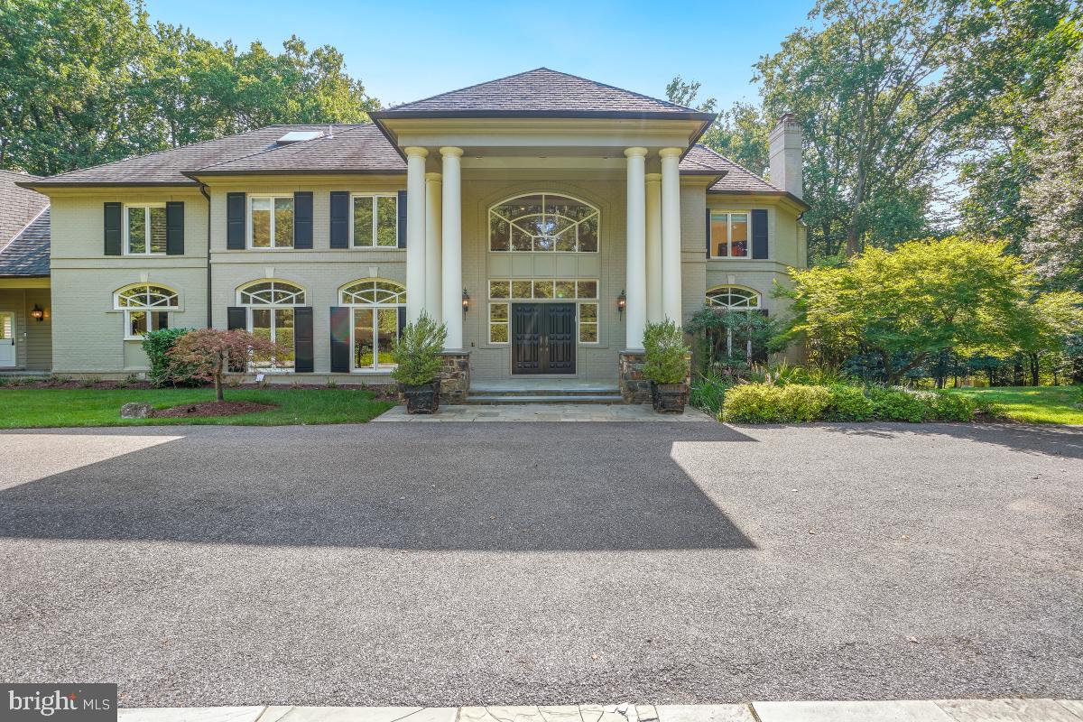 PROFESSIONAL PHOTOS WILL BE UPLOADED SOON
A true Potomac showpiece, this nearly 13,000 sq ft estate offers timeless grandeur on 2 private, cul-de-sac acres in one of the area’s most exclusive enclaves. Greeted by a stately private driveway and double front doors, enter into a soaring two-story foyer framed by dual sweeping staircases. Designed for elegant living and grand-scale entertaining, the home features 8 bedrooms, 10 bathrooms, a 3-car garage, and exquisite formal and informal spaces. The state-of-the-art kitchen is a chef’s dream with dual islands, two full-size refrigerators, a walk-in pantry, and seamless flow to the expansive flagstone patio. Outdoors, enjoy a resort-level experience with a private tennis court, a stunning saltwater pool with attached spa, and multiple terraces designed for refined entertaining.
The walk-out lower level has been completely transformed into a light-filled, private apartment-style retreat—featuring a full kitchen, 3 bedrooms, 3.5 baths, gym, laundry, and floor-to-ceiling windows throughout. Additional highlights include multiple fireplaces, an in-home sauna, and lush professional landscaping. Tucked away yet just minutes to Potomac Village, Bullis School, and all of Potomac’s premier amenities, this estate embodies privacy, prestige, and an unparalleled lifestyle.