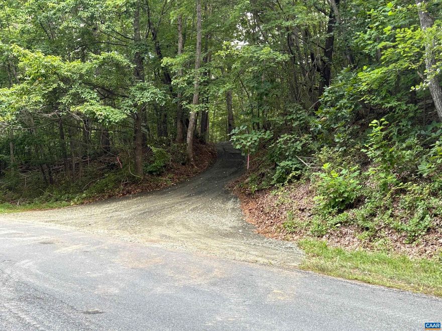 New to the market-new boundary survey dated April 21, 2025, showing 23.32+- acres.  Hard surfaced State road frontage on Thoroughfare and Beahm Town roads.  Existing entrance off Beahm Town, recently improved with gravel and a turnaround area for a mid-sized vehicle.  AOSE Soil evaluation feasibility report indicates two areas approvable for, two four bedroom homes.  The property is wholly wooded in a assorted mix of mature hardwood timber.  The elevated building sites face the northwest.  Abundant wildlife and massive rock out cropping's, add to the properties unique qualities.  Within minutes to the Towns of Culpeper, Madison and Orange.