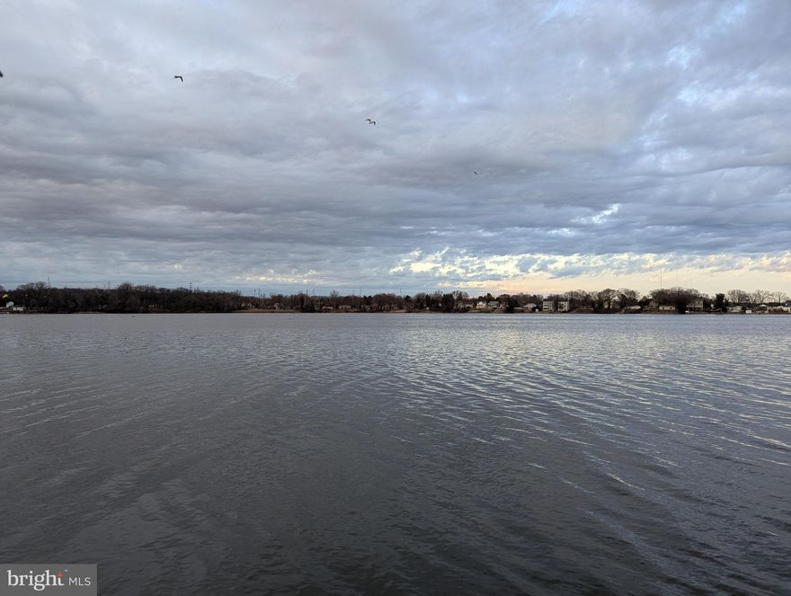 $50,000 LIST PRICE SUGGESTED OPENING BID AT AUCTION. ****NO PRE BID**** AUCTION Friday, January 24, 2025@ 11:00AM ON PREMISES Walk into mud room/ utility area w/ washer and dryer. Full bathroom. Dining room. Kitchen w/ refrigerator and electric stove. Bedrooms #1 and #2 w/closet.  Walk up floored attic (2 nd floor). Living room. Enclosed entryway from waterfront. Full basement. Partially finished clubroom. Electric hot water. Oil heat. Exit to outside. Toilet/sink/shower/bath area. Public water and sewer. Auctioneer’s Note: Home in need of renovation/repair w/ waterfront on Back River. Property would make a good rental or fix up for resale.