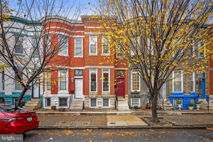 Discover the charm of this beautifully maintained rowhome just a short block and a half from Patterson Park. With 1,382 sq. ft. of thoughtfully designed living space, featuring gorgeous original hardwoods, built-ins and wood work throughout. This home truly makes you feel warm and welcome the moment you step inside.  Your main level offers three distinct living areas starting with a generously sized living room, formal dining room and kitchen at the rear of the home that leads to the lovely fenced patio with alley access. Don't forget the oh so important half bath on the main level. Three above grade bedrooms mean no one is stuck in the basement here!  Your primary bedroom leaves you feeling extra special with it's original hardwoods and stunning original built-ins. Enjoy the convenience of a laundry area located in the unfinished basement, offering ample storage and potential for customization. The neighborhood of Patterson Park is a vibrant community, known for its lush green spaces and recreational opportunities. Residents enjoy easy access to the park, walking trails, and local amenities, fostering a sense of connection and community spirit. With its blend of historic charm and modern convenience, this rowhome is not just a home; it's a lifestyle. Embrace the opportunity to live in a community that values both comfort and connection. Don't miss your chance to make this delightful property your own!