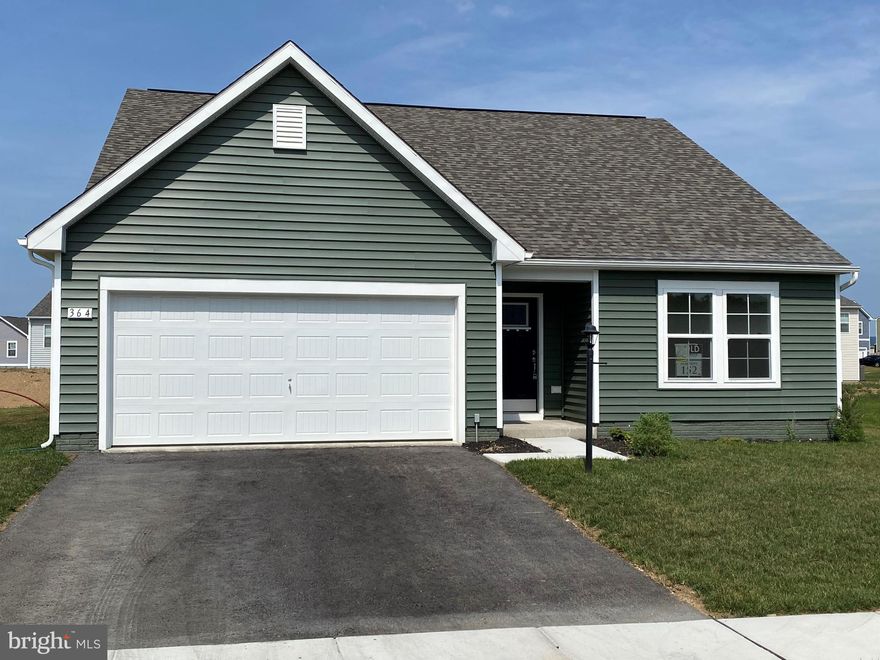 Welcome home to the Cranberry II. This lovely home is the perfect choice for those who want the ease and convenience of one-level living. If you see yourself needing more space, you can choose to add a finished basement. Walk through the gracious foyer and you will find a coat closest and easy access to the two secondary bedrooms and hall bath. The foyer leads you to the hub of this home, spacious open-concept family room and kitchen. The expansive kitchen offers plenty of counter space, a pantry and breakfast area which is the perfect spot for families to gather for meals. Directly off the breakfast area the sliding glass door leads you out to the backyard. Add a large central island and this kitchen becomes ideal for casual entertaining. Off the family room you enter the spacious owners suite with a generous walk-in closet and bath, featuring double vanity and linen closet. Lastly, the two-car garage opens to the foyer with easy access to the laundry room in this wonderful single-level home! Great home in a great spot! Quiet country setting, but still close to close to everything Winchester, Charles Town, Harpers Ferry and Martinsburg have to offer! This won't last long in this low inventory market!  ****OFFERING UP TO $10K IN CLOSING ASSISTANCE WITH THE USE OF PREFERRED LENDER AND TITLE****