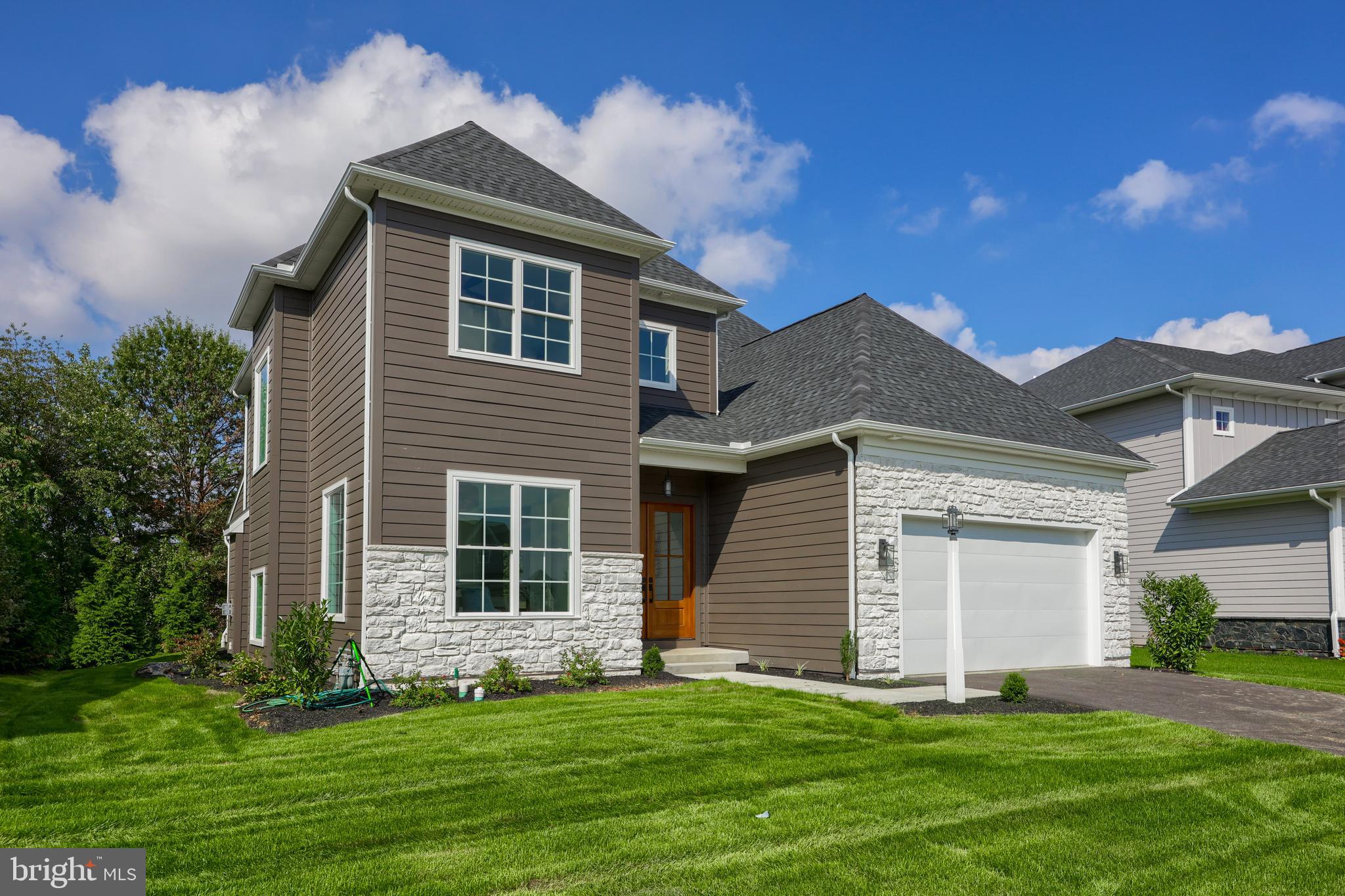 OPEN HOUSE SUNDAY 1:00-2:30*THREE MODEL HOMES IN Beautiful HAYDN MANOR Community *This 4 Bedroom, 4.5 Bathroom 3331 SF Two Story with open Floor Plan features 10' Ceilings, Great Room Coffered Ceiling, Fireplace, Gourmet Custom Kitchen with 8 Burner Gas range and Double Ovens, Granite Countertops, Tile Backsplash, White Oak Center Island/Breakfast Bar*Study/Office with French Doors and Shiplap Accent Wall*Owners Suite Luxurious Bathroom with Oversized Tiled Shower, Tile Floor, Huge Walk in Closet*Spacious Covered Patio with Built in Grille, Refrigerator, Granite Counters*Finished 796 SF Daylight Lower Level with Large Family Room, Full Bath & Storage rooms*3 Acre Community Park with Playground, Pavilion and Walking Trails* Convenient Location to Major Highways, Mad Chef, Sons Ice Cream, Dunkin Donuts*IMMEDIATE OCCUPANCY