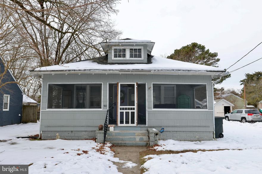 Adorable Home! This two-bedroom 1 bath beauty features updated flooring, shiplap walls and updated SS appliances. The roof was replaced in 2023. There is a recently installed Mini-Split in the main living area. The two bedrooms are both of ample size and the bath has a jetted tub. As added bonus there is a full basement area currently used for storage and mechanical items. This room has a wall heater for comfort control while you're in the area.  There is a large fenced in backyard for privacy, great for entertaining, or allowing the kiddos or pups a secure area to play. There is a storage shed for additional storage.  Add on the large screened in front porch and this home is ready for its new owners! Could be a great starter or investment property. Schedule your tour today.