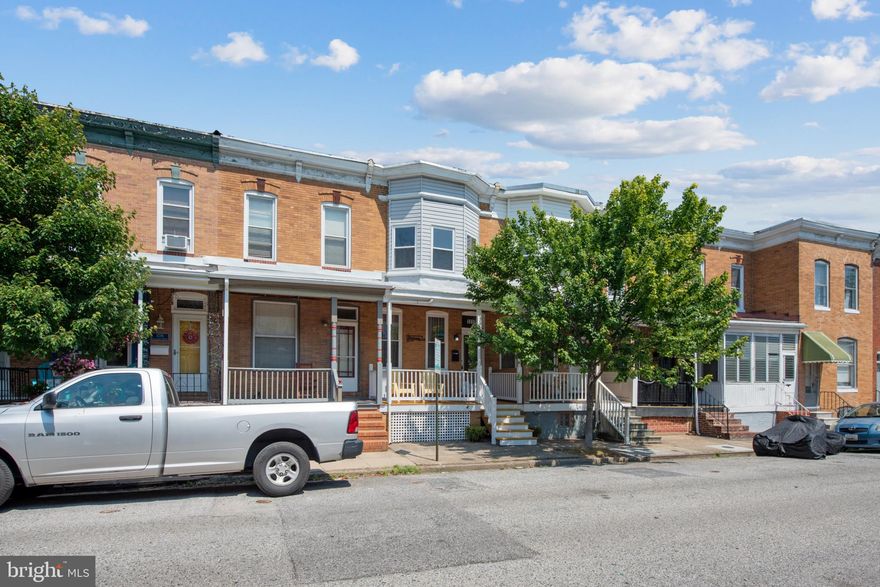 Nestled in the heart of  The Historic Pigtown neighborhood,  this charming  2 Bedroom 1.5 Bath  townhouse awaits its new owners. Boasting a pristine condition, it is move-in ready and adorned with exquisite features. A welcoming porch completes the home's exterior, inviting you to enjoy the outdoors. Upon entering, you'll be greeted by a spacious living room adorned with gleaming hardwood floors. An abundance of natural light pours in through the skylight, creating a warm and inviting ambiance. Intricate crown molding adds a touch of elegance to the space. The well-equipped kitchen features stainless steel appliances, ample cabinet space, and stylish backsplash, providing both convenience and aesthetic appeal. Upstairs offers 2 generously sized bedrooms and a full bathroom. Outside, a private patio and deck offer perfect spaces for relaxation or entertaining guests.