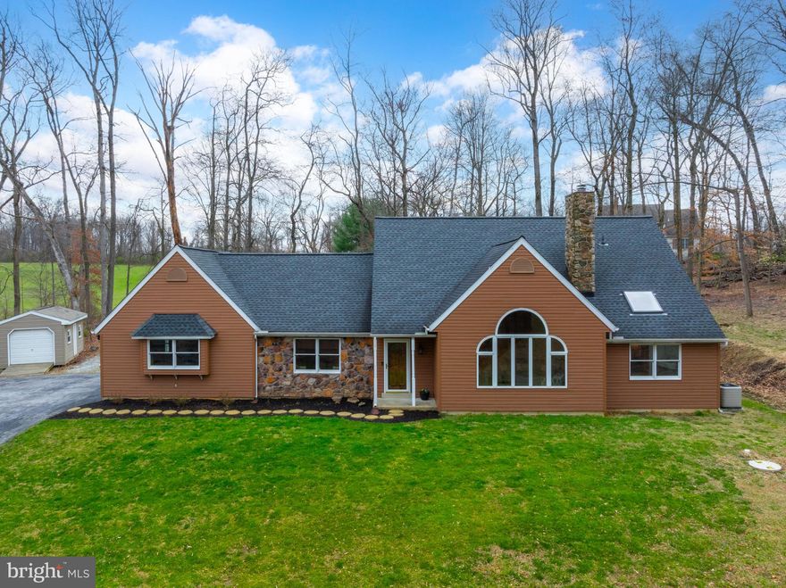 NESTLED on a picturesque 2.3-acre lot, this 4 Bedroom, 2.5 Bath custom Cape Cod home offers a versatile floor plan that allows for comfortable one floor living while providing an additional 3 bedrooms &  bath on the second floor. The sellers custom-built their home and have lovingly maintained and updated it throughout the years. The expansive lot offers endless possibilities for outdoor activities, gardening, and simply taking in the serenity of nature. Conveniently located, yet tucked away from the hustle and bustle, this home offers the perfect balance of privacy and accessibility. As you step inside, you're welcomed by a 2-story hardwood foyer, complete with French doors leading into the office—providing scenic views for those working remotely.​ New hardwood floors adorn the foyer and hallway, seamlessly blending with the existing oak staircase and living room floor. The living room boasts high ceilings and a wall of windows, offering breathtaking views, while a cozy gas fireplace adds warmth and ambiance. The heart of the home lies in the remodeled kitchen, featuring ample cabinets, a Corian island and countertops, stainless steel appliances, and a delightful ​breakfast nook with a bay window overlooking the expansive backyard. Adjacent to the kitchen, the family room invites relaxation with its new carpeting and sliding glass door leading to the spacious maintenance-free deck—perfect for outdoor entertaining or simply enjoying the tranquil sounds of the pond. Custom lighting under the built-in benches and string lights around the gazebo add to an evening setting. Back inside, you’ll find the primary bedroom with two walk-in closets, remodeled bathroom with frameless shower, double-bowl vanity with lighted mirror (displays time and weather), skylight and, if desired, enough space to add a stand-alone tub (plumbing in place). Completing the main level is an updated powder room, laundry room with utility tub and new washer and dryer, pantry closet,single door to the deck, second staircase leading to the basement and exit to the 2-car garage with man door. Ascending the oak staircase to the second level, you’ll find new carpeting in all 3 bedrooms and hallway, lighted closets in the bedrooms, an updated hall bathroom with tub, and access through one of the bedrooms to a huge bonus room above the garage. This space is convenient for storage and has potential for additional living space. The basement is expansive and features high ceilings, 2  staircases and rough-in plumbing for a 3-piece bathroom. Additional features and updates include roof (2017), exterior siding (2018), 10x20 full-size shed with electric, septic pump (2021), propane line for grill, hot water heater (2020), all carpeting (2024), hardwood flooring in foyer and hallway (2024), and central vacuum system. Within the Award-Winning Downingtown Schools with STEM Academy, and just down the street from Shamona Creek Elementary and the Marsh Creek Sixth Grade Center. Conveniently located close to Major Routes (100/113/30), PA Turnpike, Marsh Creek State Park, Struble Trail and Eagleview-home of Restaurant Row and many Shops! Call this storybook setting home and create memories for years to come!