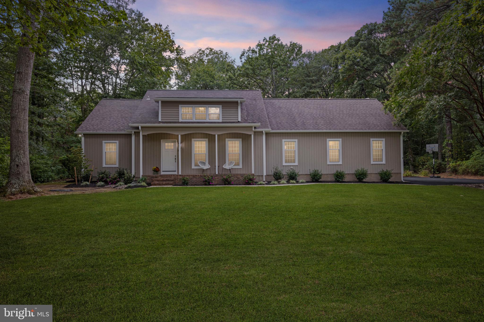 Welcome to your move-in ready retreat in Prospect Bay, the Eastern Shore's premier golf community! This beautifully maintained home offers a wooded setting that backs to the 12th hole. It combines timeless design with extensive updates and thoughtful spaces for everyday living and entertaining. All located in one of the most popular golf communities on the Eastern Shore, offering resort style amenities for members.
As you walk towards the front entrance, you'll be greeted by a welcoming front porch that overlooks your front yard at the quiet end of Fairway Island. A separate office or formal living room is tucked just off the main entrance, with a convenient coat closet and powder room located on the other side. The main level features a spacious primary suite with a bonus sitting room that opens to the rear deck and a completely remodeled primary bathroom. The heart of the home is the family room with soaring two-story ceilings, a wood fireplace, and abundant natural light, flowing seamlessly into the oversized screened porch — perfect for morning coffee, outdoor dining, or unwinding in the evenings. The kitchen was remodeled in 2023 and features a large window overlooking the private backyard, granite counters, updated lighting and appliances, and a walk-in pantry with custom built-ins. Off the kitchen, you’ll find a formal dining room that could easily be converted to a bonus office or room. The garage has direct access to the laundry room that is tucked away by the kitchen. Upstairs, there are three generously sized bedrooms with walk-in closets, one offering access to a partially finished attic space—ideal for storage or creating an additional room. The full bathroom upstairs has also been updated.
Outdoor living is easy with a rear paver patio and pathway connecting to the paved driveway, mature landscaping, and private backyard. The oversized screened porch and new primary bedroom deck provide multiple ways to enjoy the setting.
Extensive updates ensure peace of mind: oversized screened porch, French drains, sump pumps, irrigation system, and roof (2013); HVAC (2014); kitchen and bath renovations, new appliances, custom pantry, alarm system, and garage/laundry doors (2023); and a full suite of 2025 improvements including new windows, doors, flooring, paint, gutters, lighting, driveway sealing, landscaping, garage systems, and more. Every detail—inside and out—has been thoughtfully maintained or upgraded, making this home truly turnkey and ready for its next chapter. Schedule your tour today!
Prospect Bay is the premier golf community on the Eastern Shore offering 18-hole course, pickle ball, tennis, private clubhouse with restaurant and bar, driving range, pool, and more!