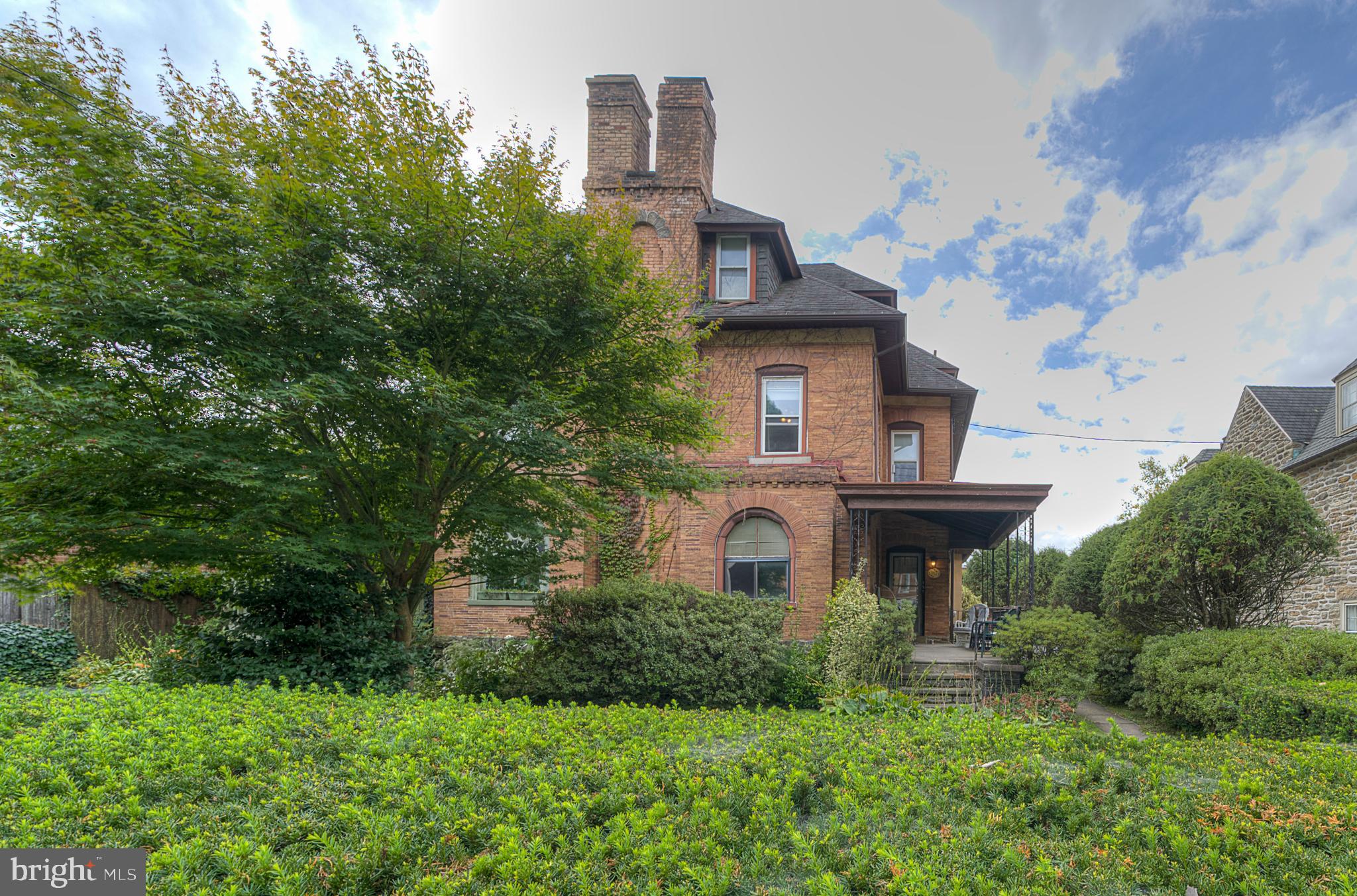 ATTENTION INVESTORS looking for a triplex in the historic Chestnut Hill section of Philadelphia?  Let's head up the pathway to the ornate front porch and enter the main door to this  well cared for home on a double lot.  The first floor unit features living room, dining room, kitchen, 2 bedroom ,1 bath, in-unit  access to the basement .  Heading up the main staircase is the 2nd floor unit features 1 bedroom, 1 bath, kitchen and separate living room.  The 3rd floor unit features 1 bedroom, 1 bath, living room, kitchen.  This home also boasts a separate 4 car garage with individual large bays which can be rented for additional income.   Property can also be converted back to a signal family home. This home is close to the shops and restaurants on the cobble stone streets of  Chestnut Hill, the Trails of Wissahickon (Fairmount Park), Pennsylvania Turnpike, Route 309 and Philadelphia Regional Rails (hop on the Chestnut Hill East line and head to Center City Philadelphia for Museums, Dining and the Arts or take the train to 30th Street Station and grab Amtrak for a quick ride to New York City). Garage is being sold as-is.