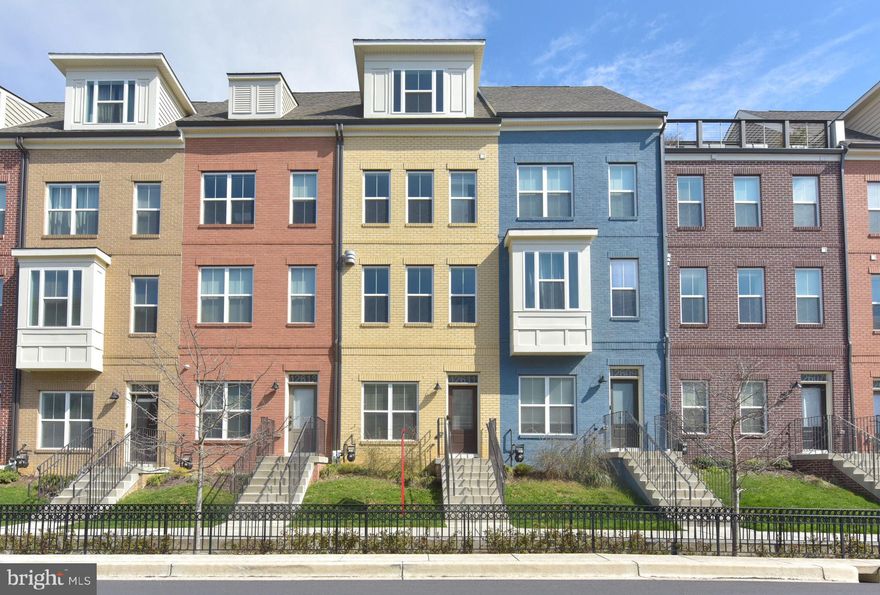 Multiple Offers Received. Sellers are asking your Highest & Best Offer by 9:00PM. A decision will made shortly after! Thank You! 

Please contact Alt-Agent Alem Mengesha with any questions.

Your new home awaits! Welcome to 12611 Macaulay Street, a spectacular interior townhome with a modern brownstone feel, built in 2017 by Winchester Homes in an urban community catered for all. 

With an idyllic location at Glenmont Metrocentre, you are mere steps from shopping and dining with accessibility to public transportation, downtown, and all major commuter routes. This spacious, like new, 4 level home boasts 3 bedrooms, 3.5 baths, a gourmet kitchen, and a private rooftop terrace. 

The lower level welcomes you with a multi purpose flex space and accessibility to the rear garage. The main level is the heart of the home with an open concept, bright gourmet kitchen, with upgrades galore! Including upgraded granite countertops, wood flooring and stainless steel, top of the line appliances.  You'll want to stay and nestle into your dining and living room spaces relaxing by a cozy, gaslit fireplace! 

The upper level is where you will retreat to the owner suite adorned with a spa-like bathroom and walk in closets. Another bedroom with a private en suite bathroom is located down the hallway. The top floor contains another bedroom, full bathroom, and a separate den/flex space which connects to the rear terrace, perfect for hosting guests with Springtime and warmer weather upon us. 

This is it! Come see for yourself, this pristine model like home is turn key and awaits your next chapter!