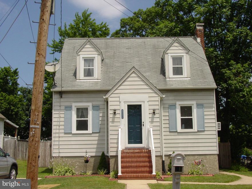 Show & sell! Beautiful home! Classic Cape Cod style! Living Room featuring a brick and tile wood burning fireplace! Nice hardwood floors thru out, cozy sun room, the best fenced yard w/patio & plantings.  Off street parking! Super list price for this detached home! Shows extremely well but sold "as is".  Don't miss this home!