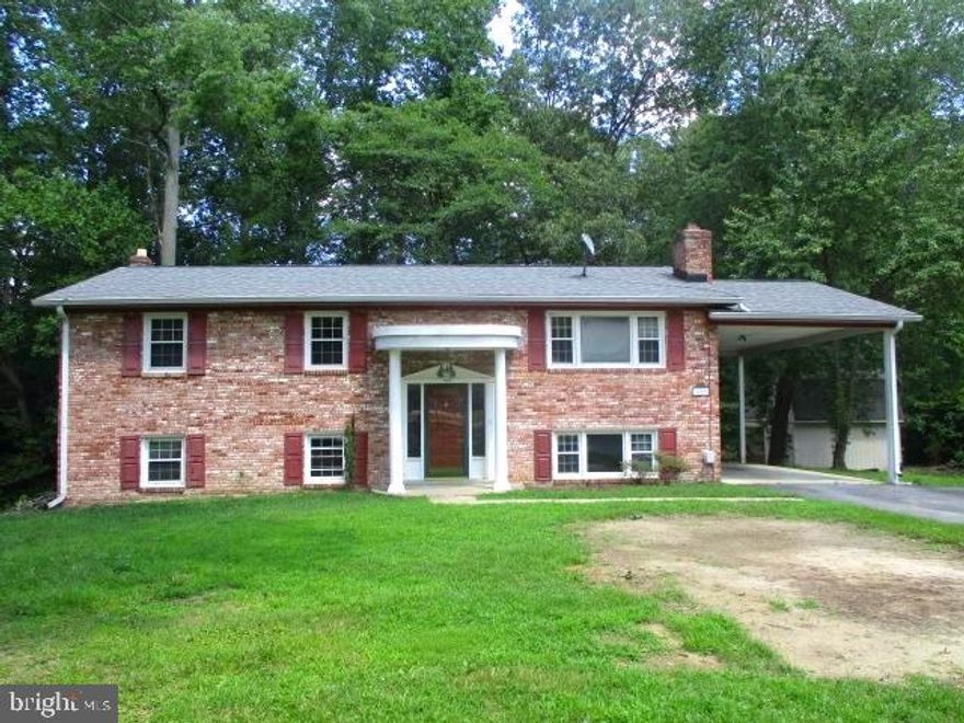 Final touch ups are going on.  Located in Indian Creek Estates.  This split foyer home is host to four bedrooms, three full baths, large entertainment room with fireplace, hardwood floors,  screened back porch, large storage shed.  Located at the end of the cul du sac  sited on  just over an acre of land.